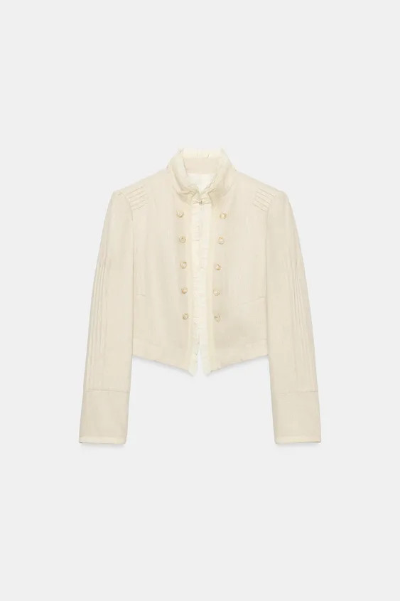 Open blazer featuring ruffles, long sleeves with shoulder pads, and pintuck detailing. Faux front... | Zara US