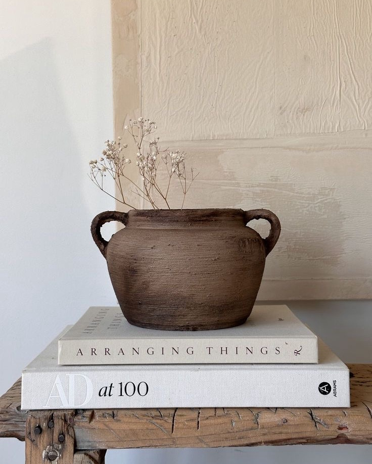 The easiest way to make a space look styled and intentional? Faux books. I love how polished and timeless they feel. 🤎

#LTKU #LTKSeasonal #LTKHome