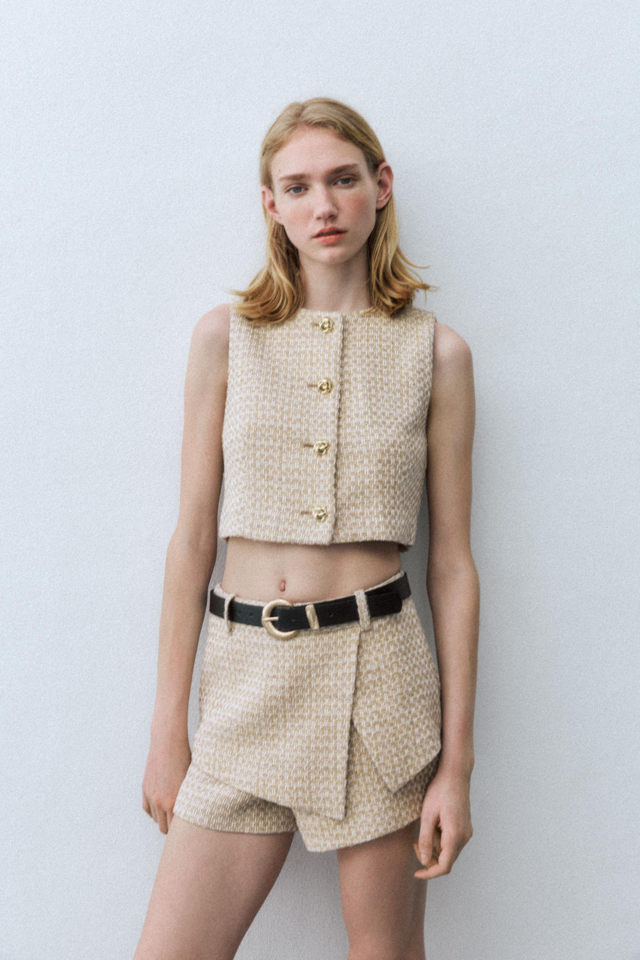 High-waisted skort with belt. Crossover front detail and metallic threading. Hidden in-seam side ... | Zara US