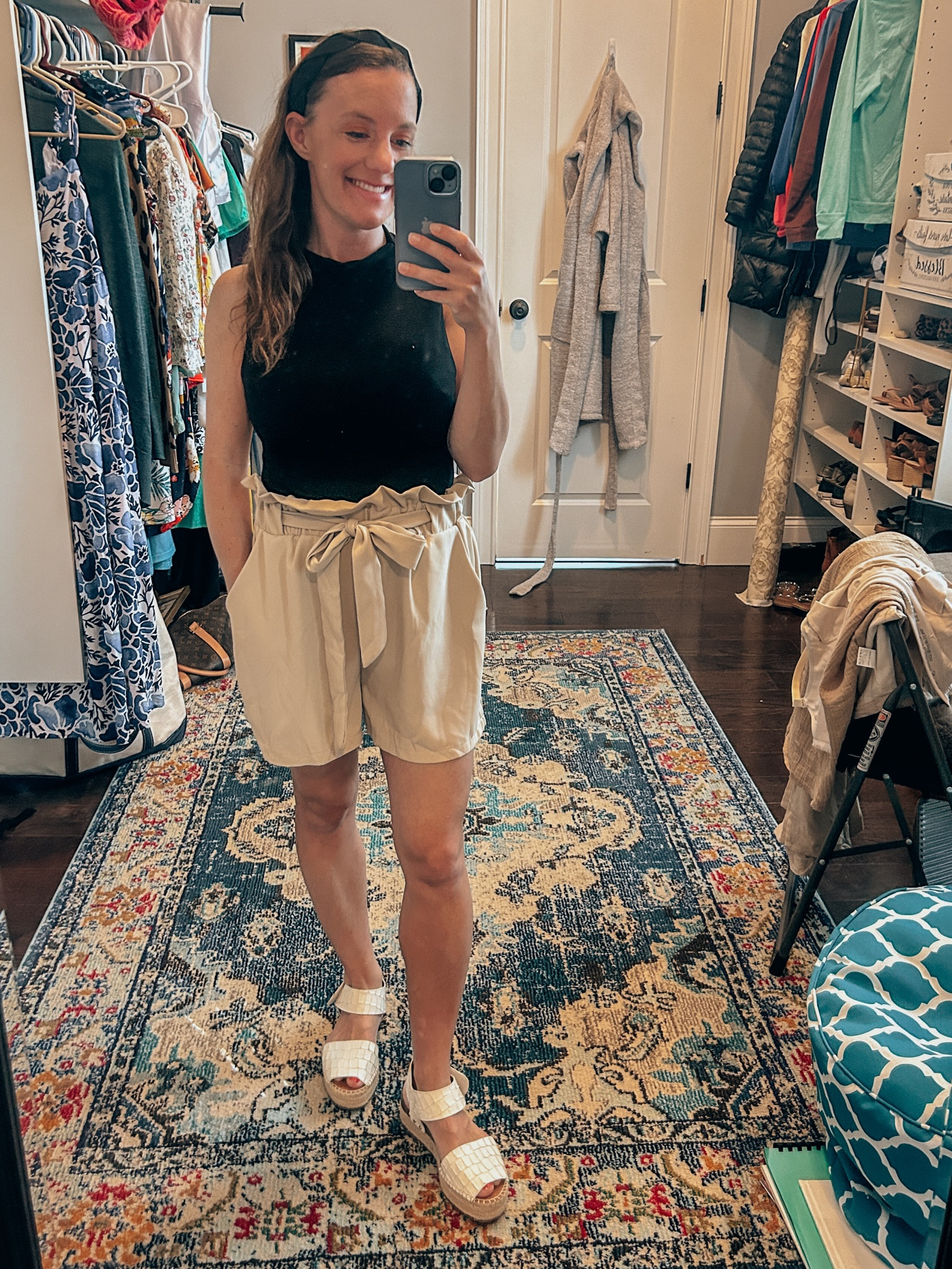 Trendy summer outfit in neutral colors 
Mid length shorts with bow 
Flowy shorts and tight tank with high neck 
Cute neutral headband 
White platform sandals 



#LTKfindsunder100 #LTKstyletip #LTKSeasonal