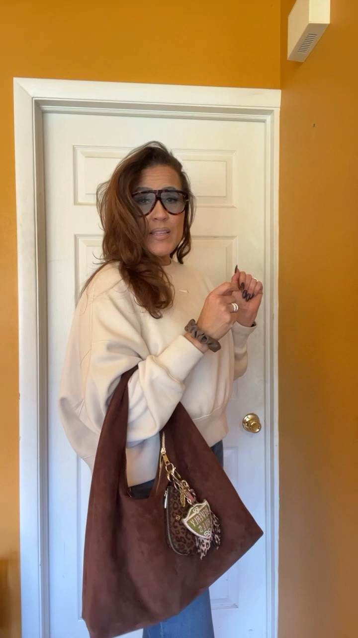 Fall fashion is my favorite and this chocolate brown suede handbag is seriously so good and budget friendly!! Target style, Fall accessories, Fall outfit @target #LaidbackLuxeLife

Oversized Sweatshirt: L
Jeans: 10 Long

Hey Beautiful! Feel free to comment on this post if you have any questions! 🫶🏽

Follow me for more fashion finds, beauty faves, lifestyle, home decor, sales and more! So glad you’re here!! XO, Karma

#LTKFindsUnder100 #LTKFindsUnder50 #LTKSeasonal