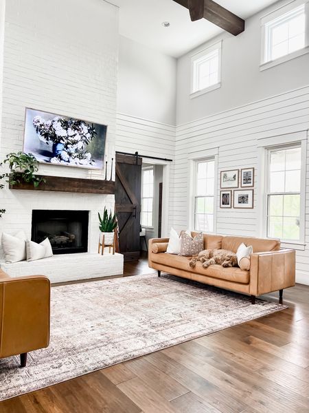 Modern farmhouse transitional classic hamptons style home decor living room open floor plan family room den sitting room leather sofa couches loloi cloud pile Margot rug candlesticks frames gallery wall picture frame throw pillows covers 

#LTKFind #LTKSeasonal #LTKhome