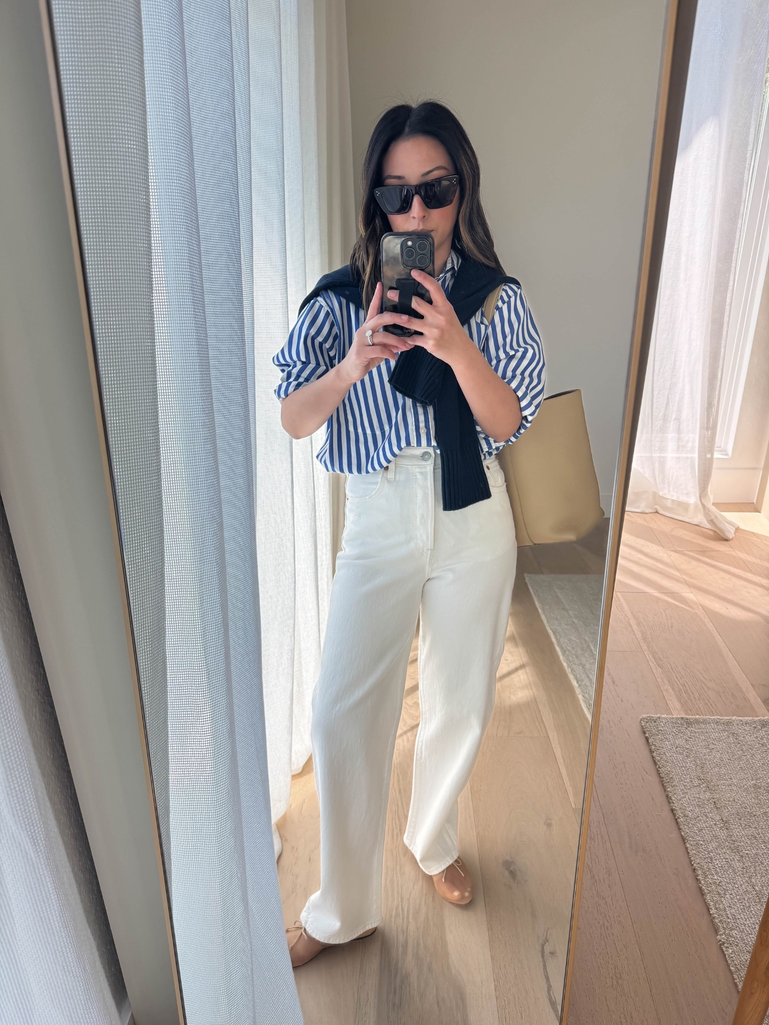 Spring outfit ideas. 

Gap Big Shirt petite xs
Levi’s Rib Cage Ankle 25
Everlane cotton sweater xs
Loeffler Randall flats 5
The row. Park tote medium - linked similar 
Celine sunglasses 
Dorsey James necklace 15”
Quince earrings

Spring outfits 2026, spring style, petite style, white jeans 

#LTKmomlife #LTKootd #LTKPetite