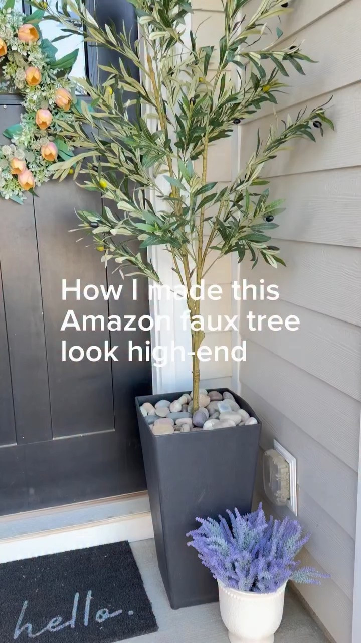 How I made this Amazon faux tree look high-end 🤍

The secret is all in the base.

I swapped the basic pot for an oversized planter, added a box inside to give it height, then filled the space so it feels full and grounded (yes… even packaging works 😅).

Topped it with rocks for that clean, finished look—but moss would be just as pretty depending on your style.

Such a simple upgrade, but it completely changes the look.

Follow along for more simple home upgrades ✨

#homedecor #entrywayinspo #fauxplants #decorhacks #amazonhome 

neutralhome modernorganic homeideas entrywaydecor

#LTKSeasonal #LTKSaleAlert #LTKHome