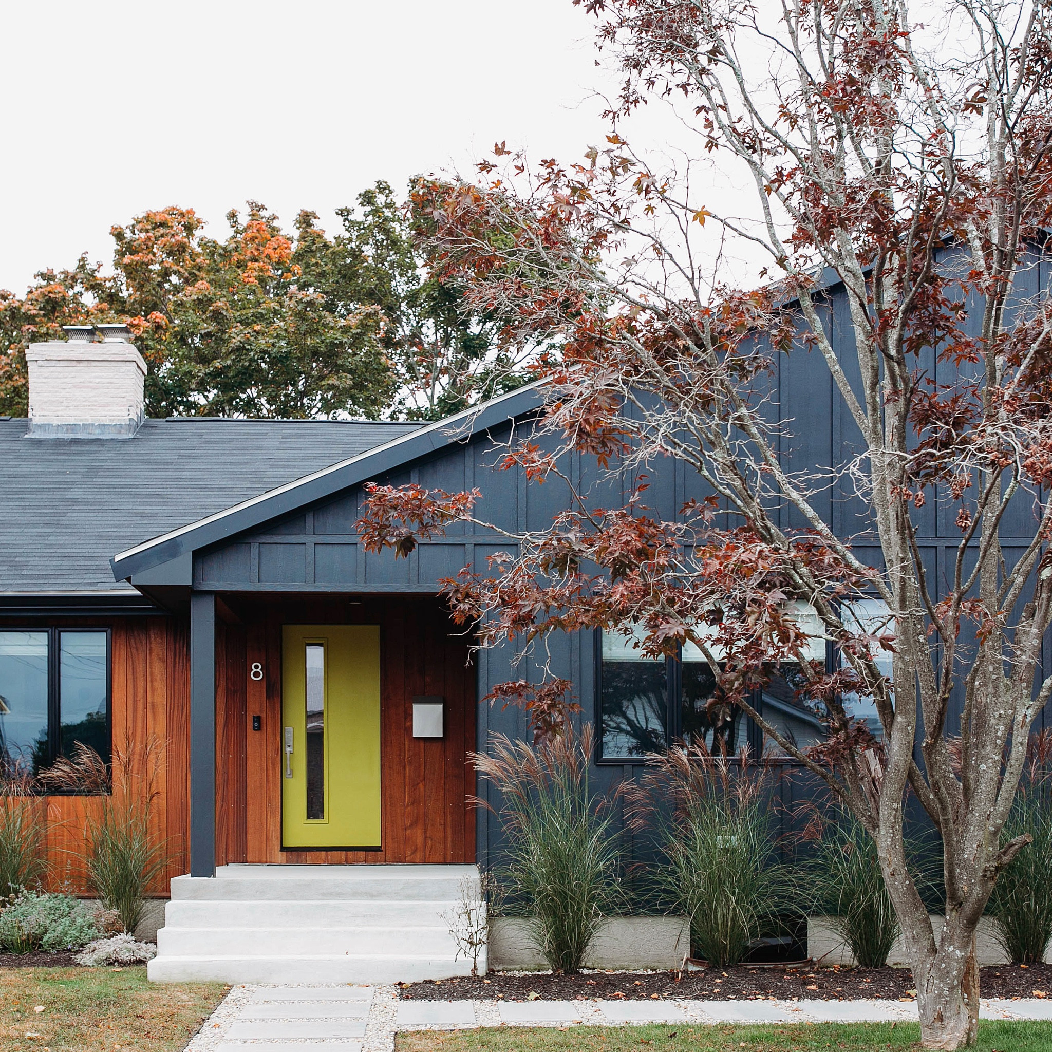 our goal with this #dwelloctoberstudio exterior renovation was to peel back the vinyl siding and stone facade and take the house back to its mid-century roots. we knew we wanted to go dark with the color to create a dramatic impact and use vertical siding to give the illusion of height to this one level home. while the black siding was used on the majority of the house, we made sure to incorporate a bit of genuine wood siding to add some warmth and capture a key element of mid-century modern design. this exterior renovation proved to be a dramatic before and after, but as with the interior of this house, our main goal was to simplify and create a modern look. #dwelloctoberrealestate #dwelloctober

#LTKHome