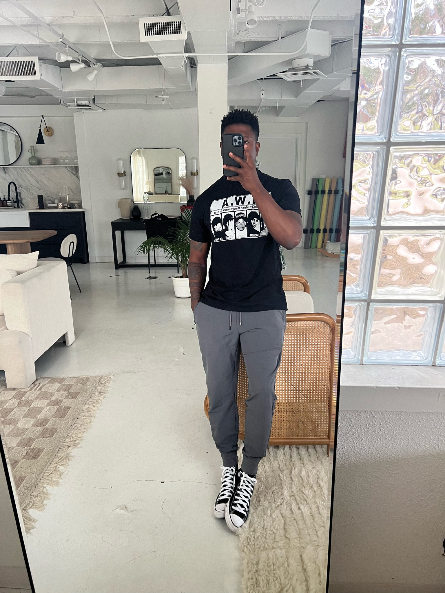 Black NWA graphic tee, grey jogger sweatpants, and black and white chuck Taylor sneakers 

#LTKsalealert #LTKmens #LTKshoecrush
