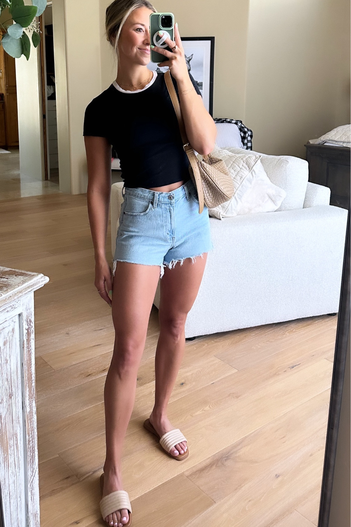 Loving this style of Abercrombie jean shorts! 90s relaxed cutoff jeans! The white detail on this top is so cute. Amazon purse and shoes! 

#LTKFindsUnder50 #LTKStyleTip