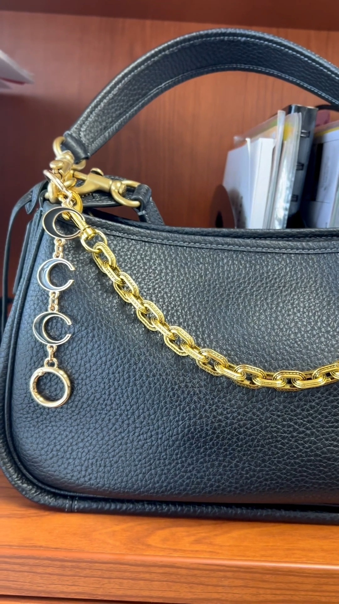 Affordable finds that make your bag look expensive.
Obsessed with these Amazon gold purse charms on my Coach bag. Such a simple way to elevate an everyday purse.
