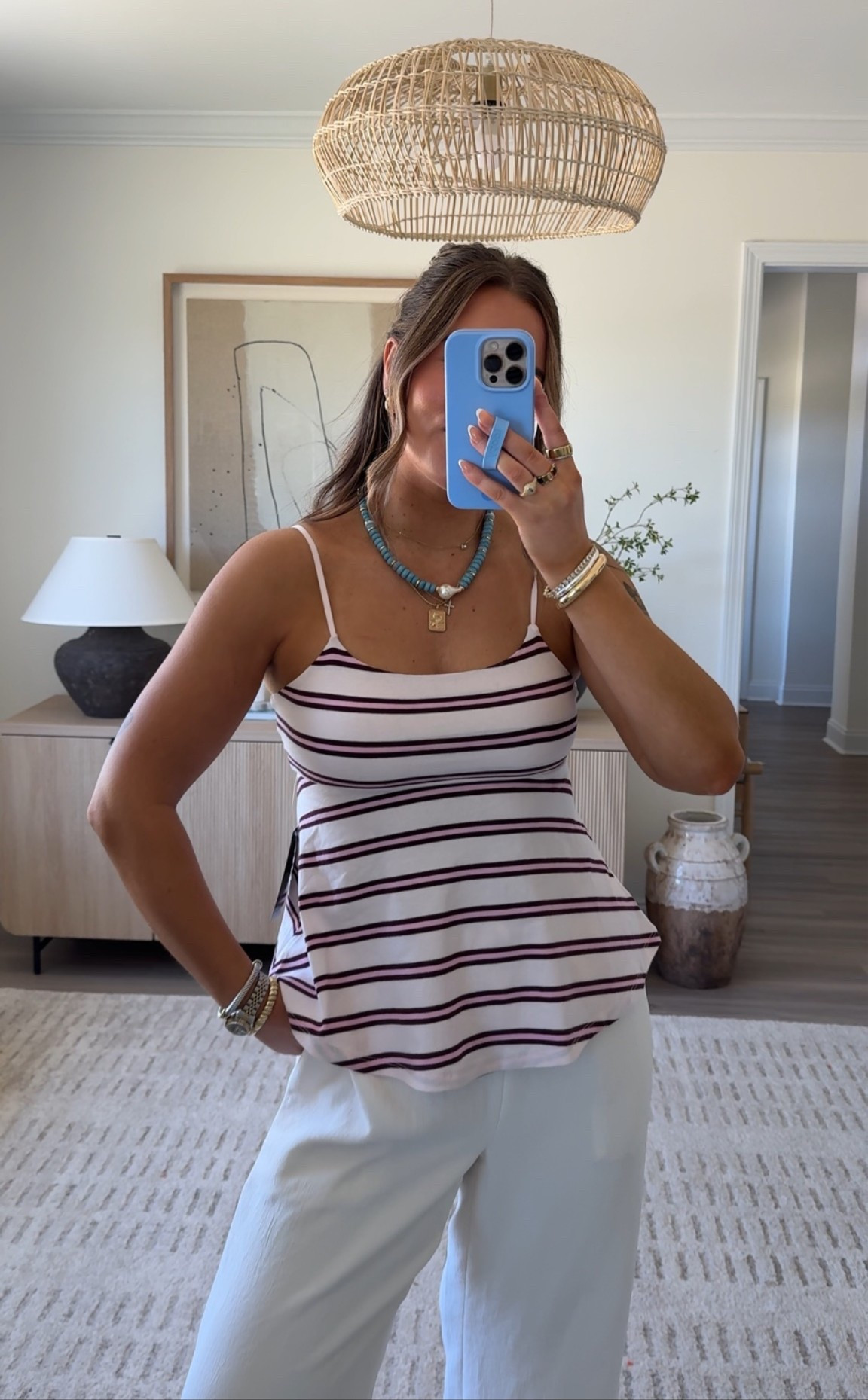 Wearing a medium in the top

Summer outfit. Striped top. Aritzia pants

#LTKootd