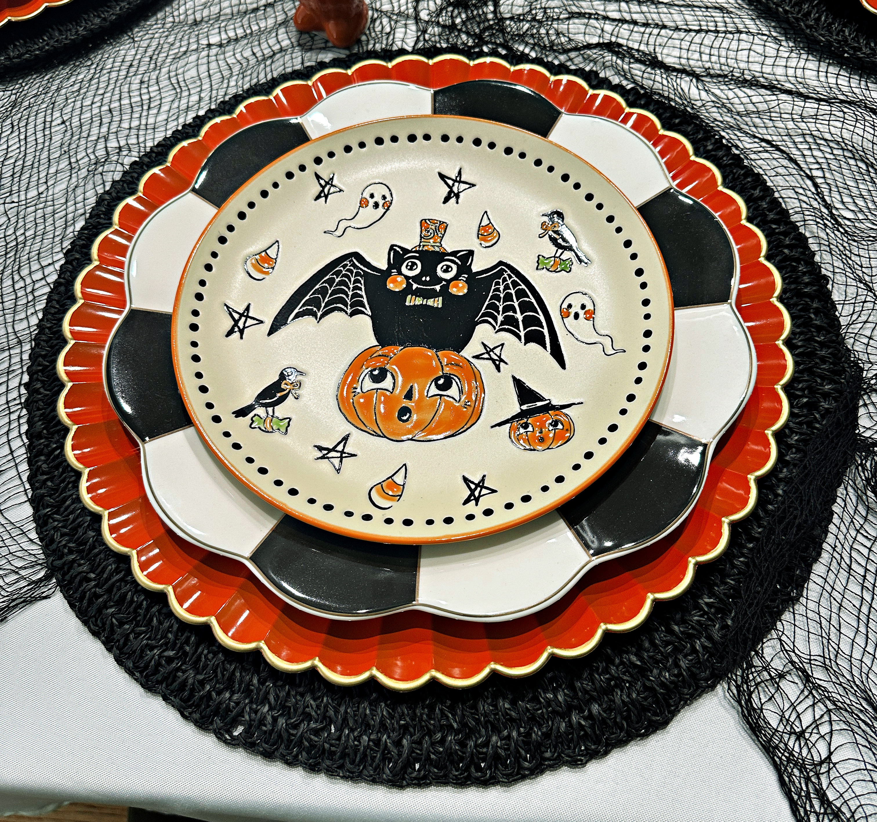 Go Vintage for your Halloween table with this fun place setting!  Get all of the layers right her!  Makes for a fun vintage Halloween tablescape!  

 #LTKSeasonal #LTKHome