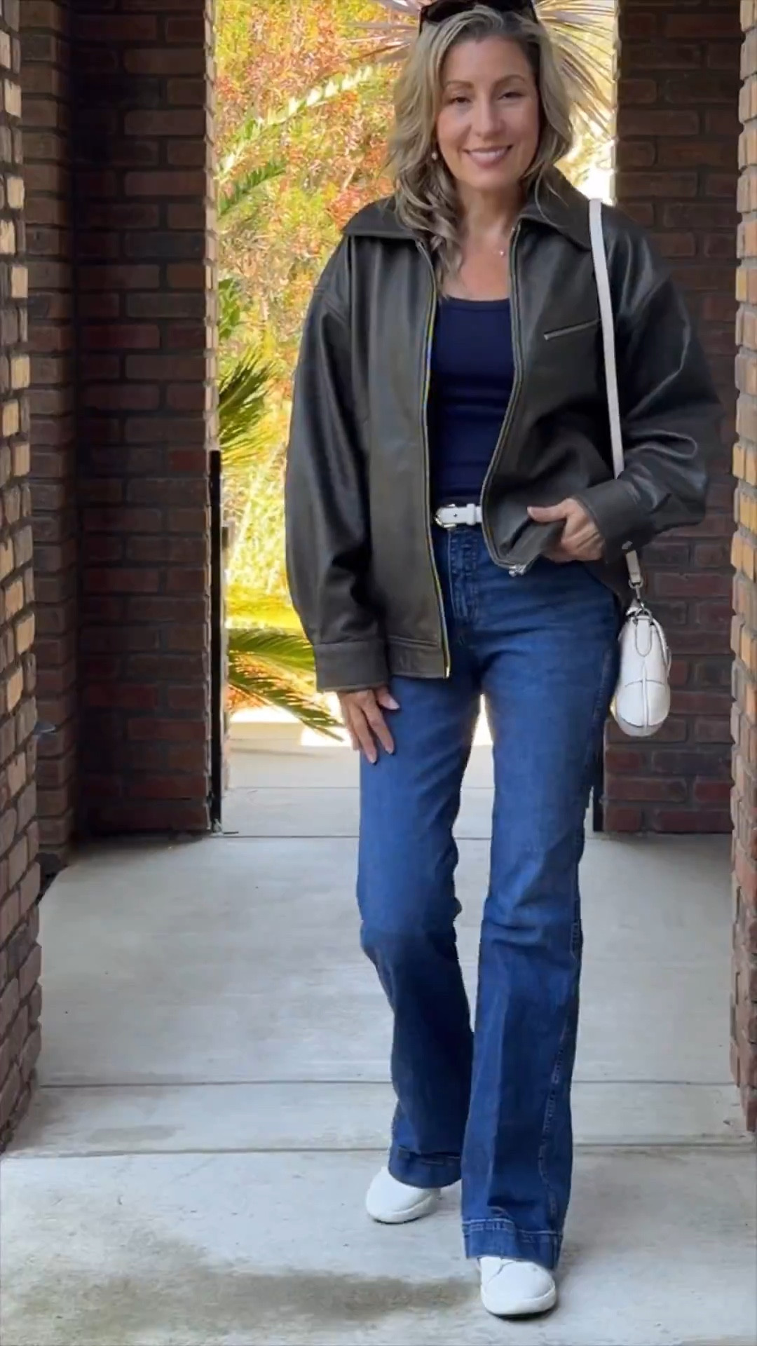 This Oversized Leather Jacket from Quince is my new uniform. It instantly elevates any casual look! The fit is perfectly slouchy and the dark, rich color (is it brown? is it black? it's perfect!) makes it super versatile for fall. Seriously feels like luxury on a budget.

I've styled it here with my favorite bootcut denim, a basic cotton tee, and white sneakers & bag for an effortless weekend vibe.

Tap the link to shop this jacket and the rest of my outfit!

#quince #quincehaul #leatherjacket #oversizedjacket #motojacket #fallootd #ootd #fallfashion #elevatedcasual #flaredjeans #denimstyle #weekendstyle #darkacademia #ltkfall #ltkstyle #affordableluxury #shacket



#LTKActive #LTKSeasonal #LTKOver40