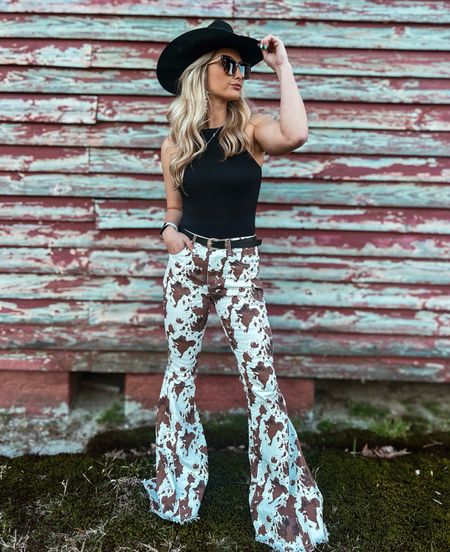 ALLIE COWPRINT FLARED DENIM PANTS, AMBER COMPRESSION HIGH NECK BODYSUIT + RHINESTONE WESTERN COWGIRL BOOTS from Willow boutique! Use code: AMBERM20 

#LTKsalealert #LTKfindsunder50 #LTKU