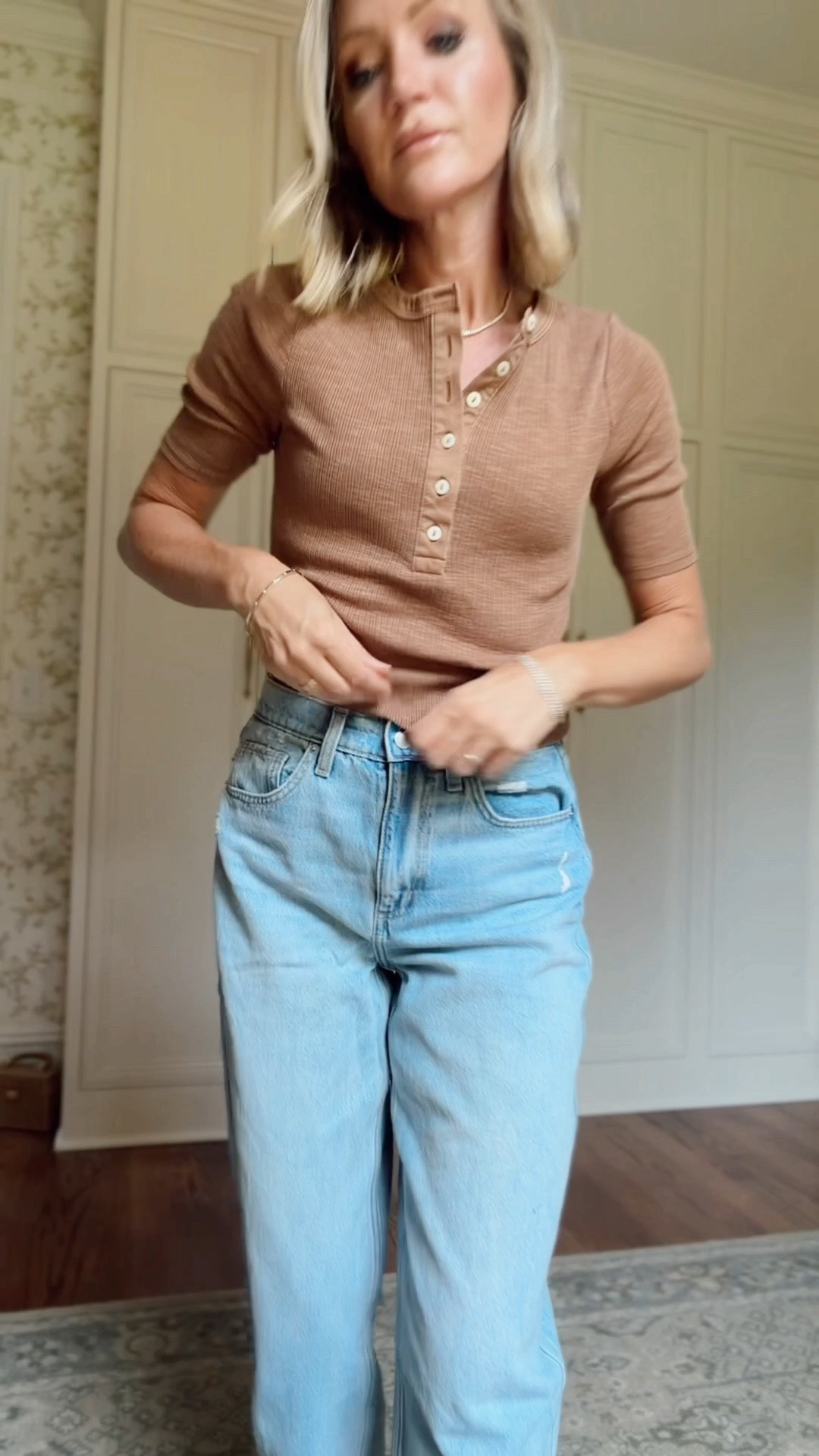 Xs in tops 
2 in barrel jeans 
Sized up to the 4 in flare jeans 
Xs in sweaters and sweatshirts 
S in tee