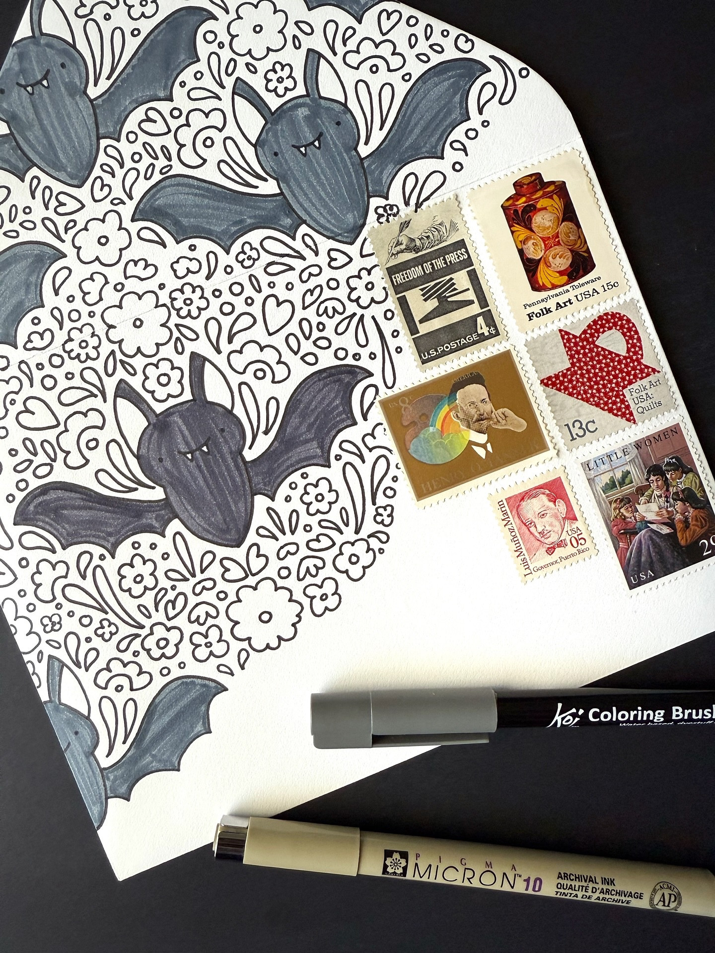 Day 20: Folk Art 🦇🌼💌

Not gonna lie, this one puzzled me for a bit because folk art can be so many things, so I decided to pick something Halloween that I haven’t really done yet — a bat — and go with that angle. Mixed that with a semi-Scandinavian folk art vibe with flowers and doodles and such, and we’ve got this cutie. My only regret is accidentally grabbing the wrong gray marker, so the middle bat is a slightly different shade than the rest. Oops. 

Thank you so much to everyone who submitting their name and address last Friday. I’ll be working your names into my art soon, and I am so excited for them to have homes! If you missed your chance to get an envelope, I might do another quick giveaway, so watch for that in the captions or my stories.

Find all my supplies linked in my bio. And if you shop Paper Source, save with code BRENNAMEDIA10
🖊️: @sakuraofamerica Pigma Micron 10 and Koi Coloring Brush pen
✉️: @papersource envelope
.
.
.
#bewitchingenvelopes #bewitchingenvelopes2025
#papersource #bewitchingenvelopes #countdowntohalloween #halloweencountdown #halloween #halloweenlove @papersource #papersource #papersourcecreativecollective #folkart #folkartmail #folkartstamp #bat #batart #batartwork #halloweenart #snailmailideas #vintagestamp #vintagestamps