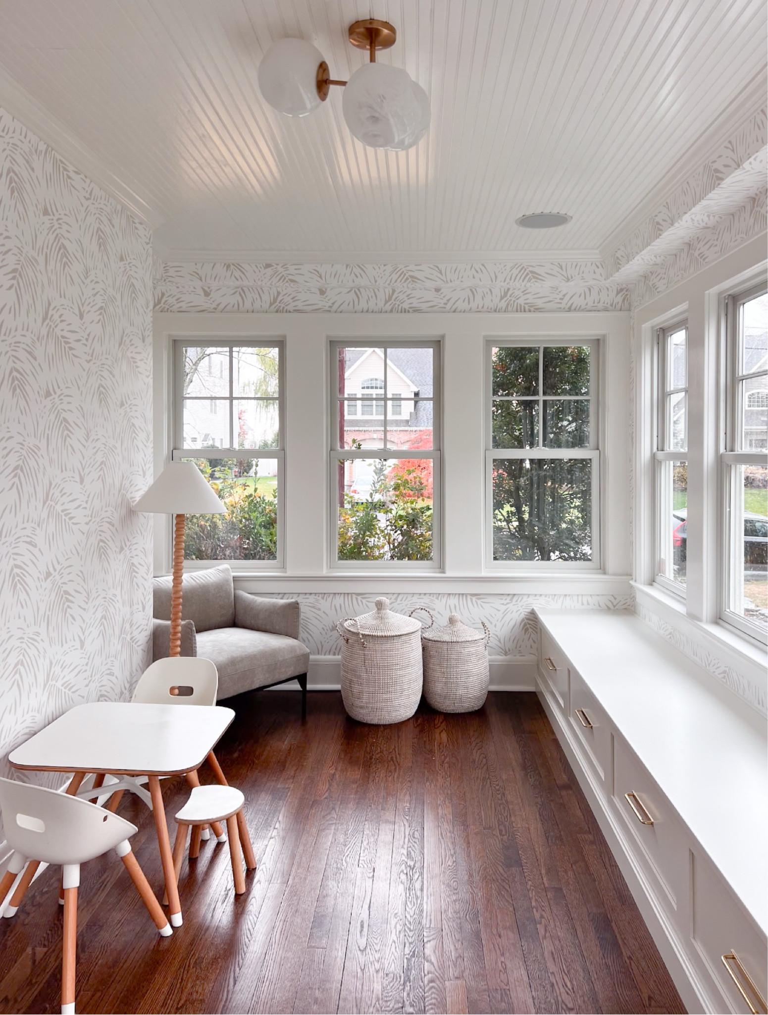 Neutral playroom, playroom design, Anthropologie chandelier, Serena & Lily wallpaper, La Jolla basket, kids room, spindle lamp 

#LTKHome #LTKKids #LTKFamily