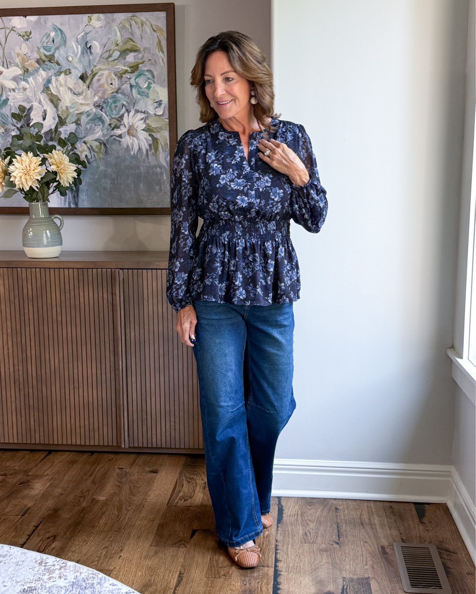 When You Want Jeans to Feel a Little More Feminine

A dark floral blouse adds softness and polish to everyday denim without making the outfit feel dressy. The defined waist gives it shape while the sheer sleeves add just enough detail—an easy dinner, date night or elevated everyday look.

#floralblouse #jeansoutfit #casualchic #womenover50 #fallstyle