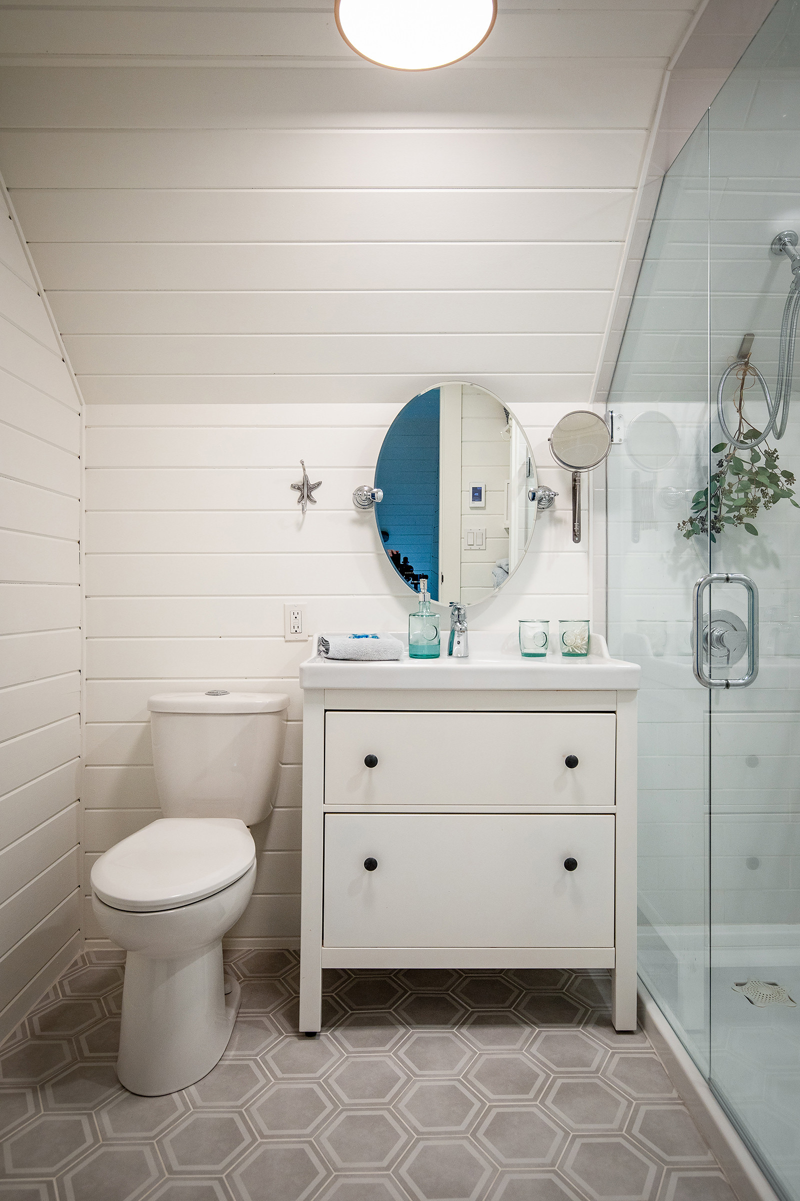 This Hemnes Vanity from IKEA is the third one I own as I have one in each bathroom.  The drawers, which I much prefer to shelves, hold so many of my bathroom products.  It's small but mighty.  They come in a variety of sizes so check to see which one is right for your space.   

 

#LTKhome