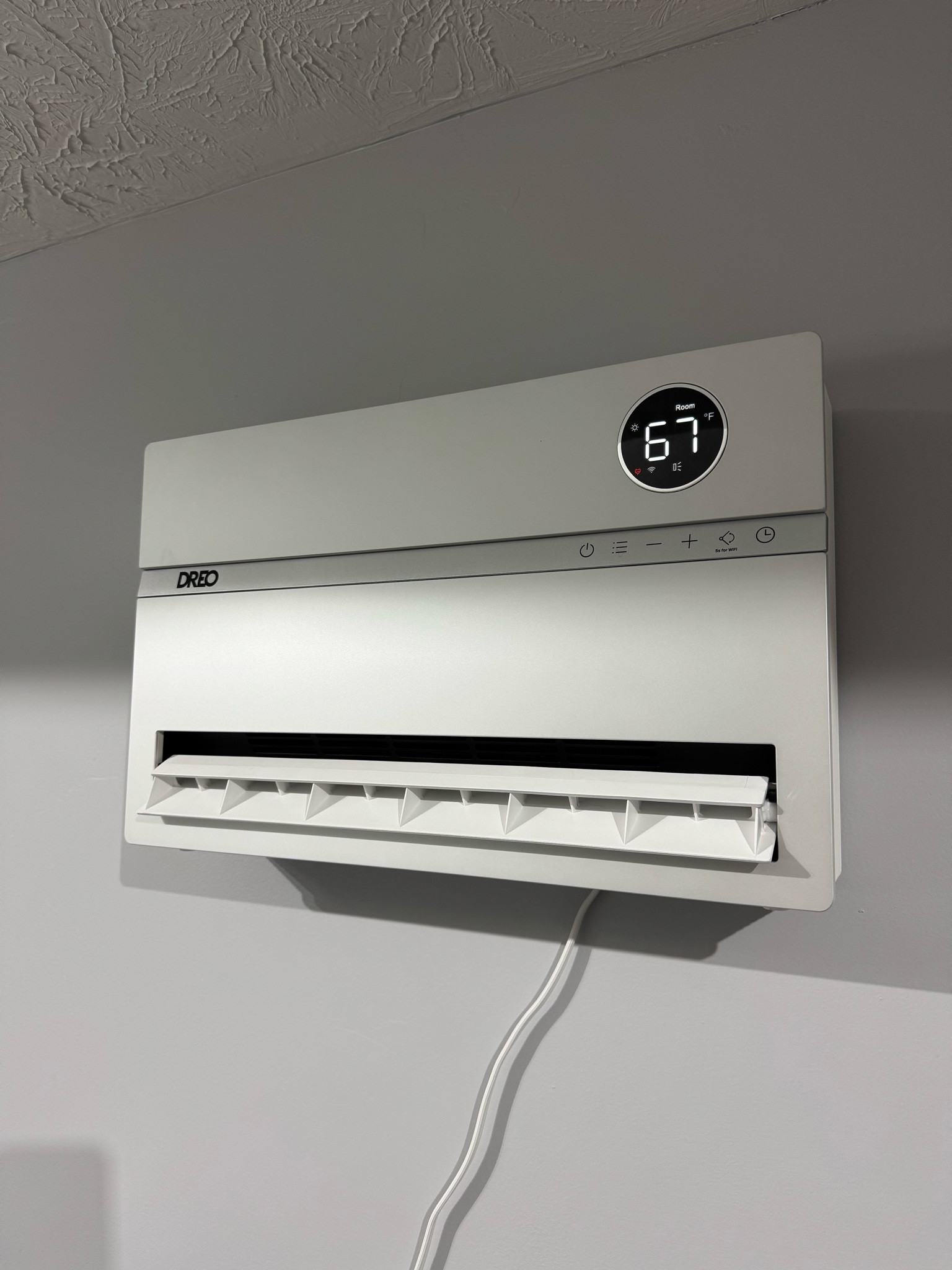 As some of you may now, I have my treadmill set up in my garage. I live on the East Coast and unfortunately our winters here in Pennsylvania can get pretty cold. 

It’s hard to find the motivation to work out sometimes, but it’s especially hard when you know you have to head into a freezing cold garage to do it. 

In winter’s past, I had a small space heater I’d turn on before working out, but it never really did much. 

This year, I didn’t want to use being cold as an excuse to not hop on the treadmill so I decided to research wall mounted heaters and opposed to wasting my time with tiny floor space heaters. 

I stumbled upon this one on Amazon. It got good reviews and had a super reasonable price tag. 

I can confidently say, this heater is AMAZING. It makes all the difference in the world. Normally the garage is about 40 degrees during the cold winter months. Sometimes lower. But as you can see in this video/photo, the heater’s gauge  shows a reading between 67° and 68°. 

If you’re in the market for a wall mounted heater to help keep your garage warm, or any other area of your home, for that matter, definitely put this one in the running. It’s been a lifesaver. 

(It also comes with a remote Bluetooth technology. You can even link it to your Alexa or Siri.)

#LTKSeasonal #LTKHome #LTKOver40