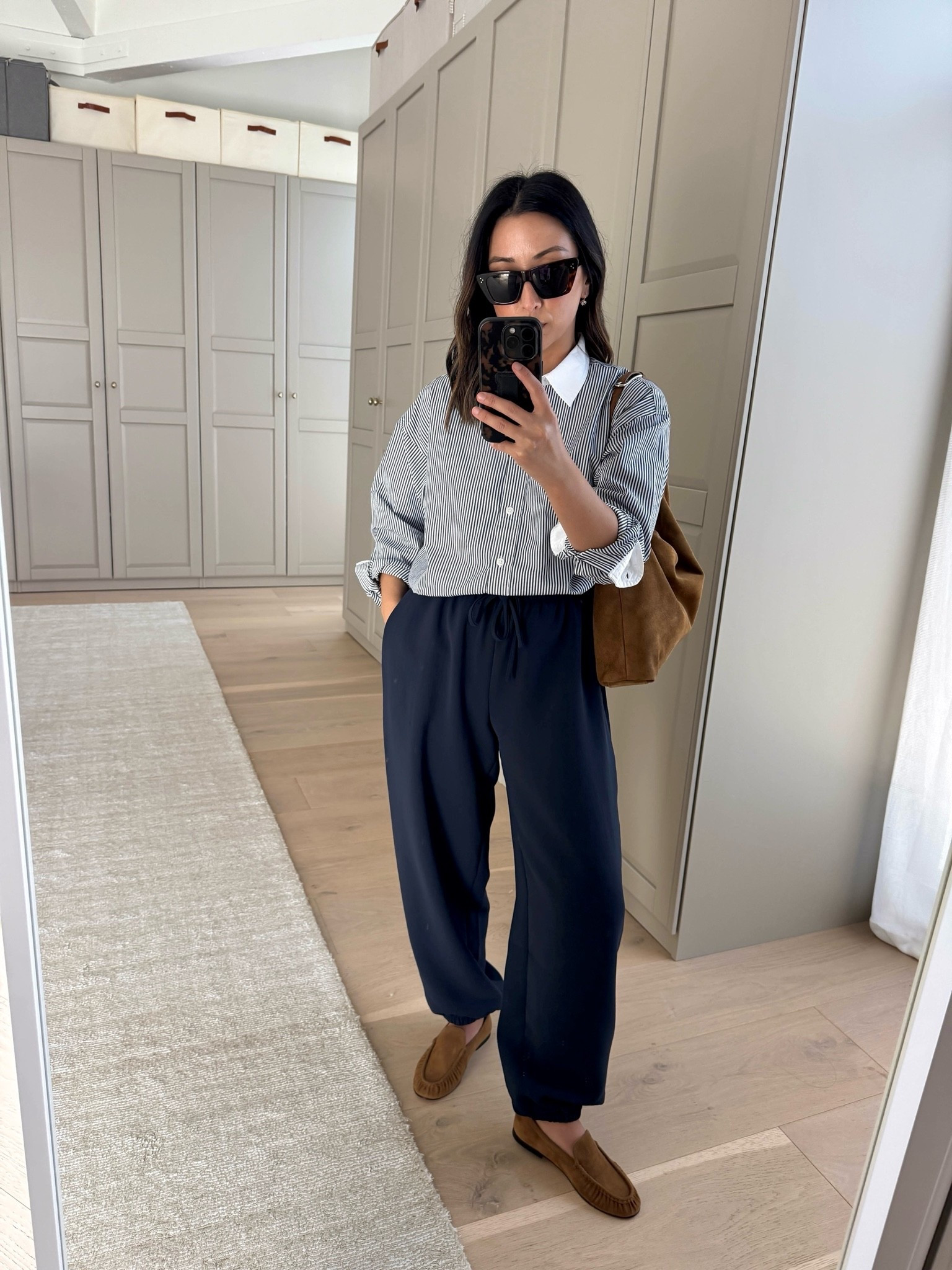 Aritzia Balloon pants in the same material as the Lodge. The Lodge don’t fit me, so these are the next best thing! Petite-friendly, so comfy!

J.crew shirt 4 - old
Aritzia Balloon pants xs
Vince loafers 5
Quince sweater xs
Liffner shoulder bag -‘old
Celine sunglasses 
Electric picks earrings

#LTKmomlife #LTKPetite #LTKWorkwear