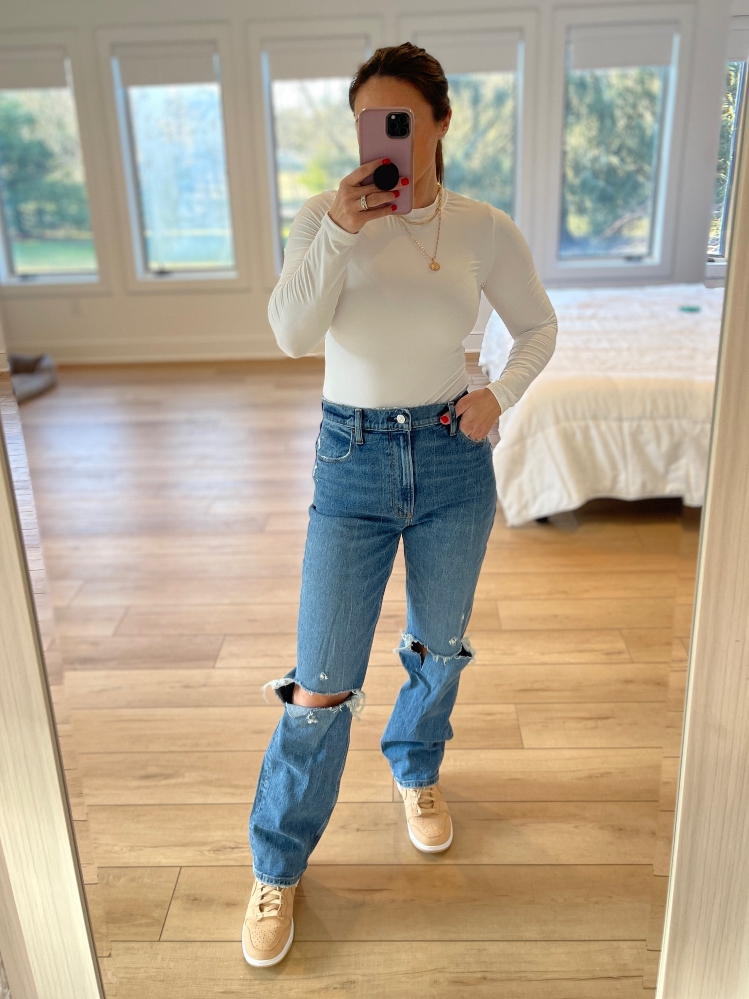 Ultra high rise distressed jeans. I’m 5’4” and in the regular length. 

Jeans, bodysuit, and sneakers fit true to size. #ltkfind #ltkunder50 #nikedunks

#LTKshoecrush #LTKsalealert #LTKunder50