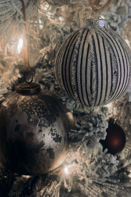 Christmas tree // brown ornaments // holiday decor

#LTKSeasonal #LTKhome #LTKHoliday