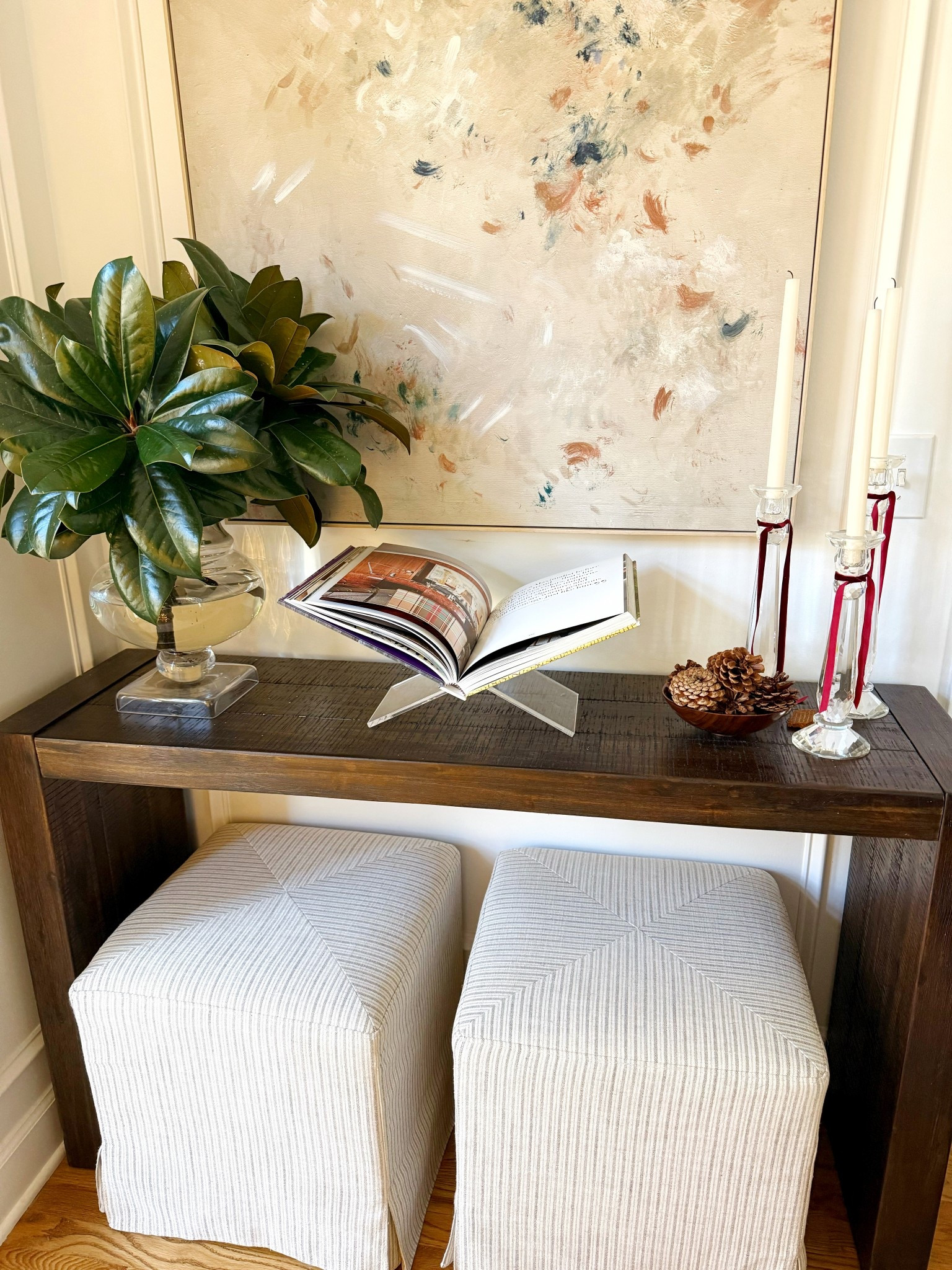 These magnolia stems look so pretty in my favorite hurricane/vase from @houseofblum  The candlesticks are also my favorite!  I use both all year round.  

#LTKHome #LTKHoliday