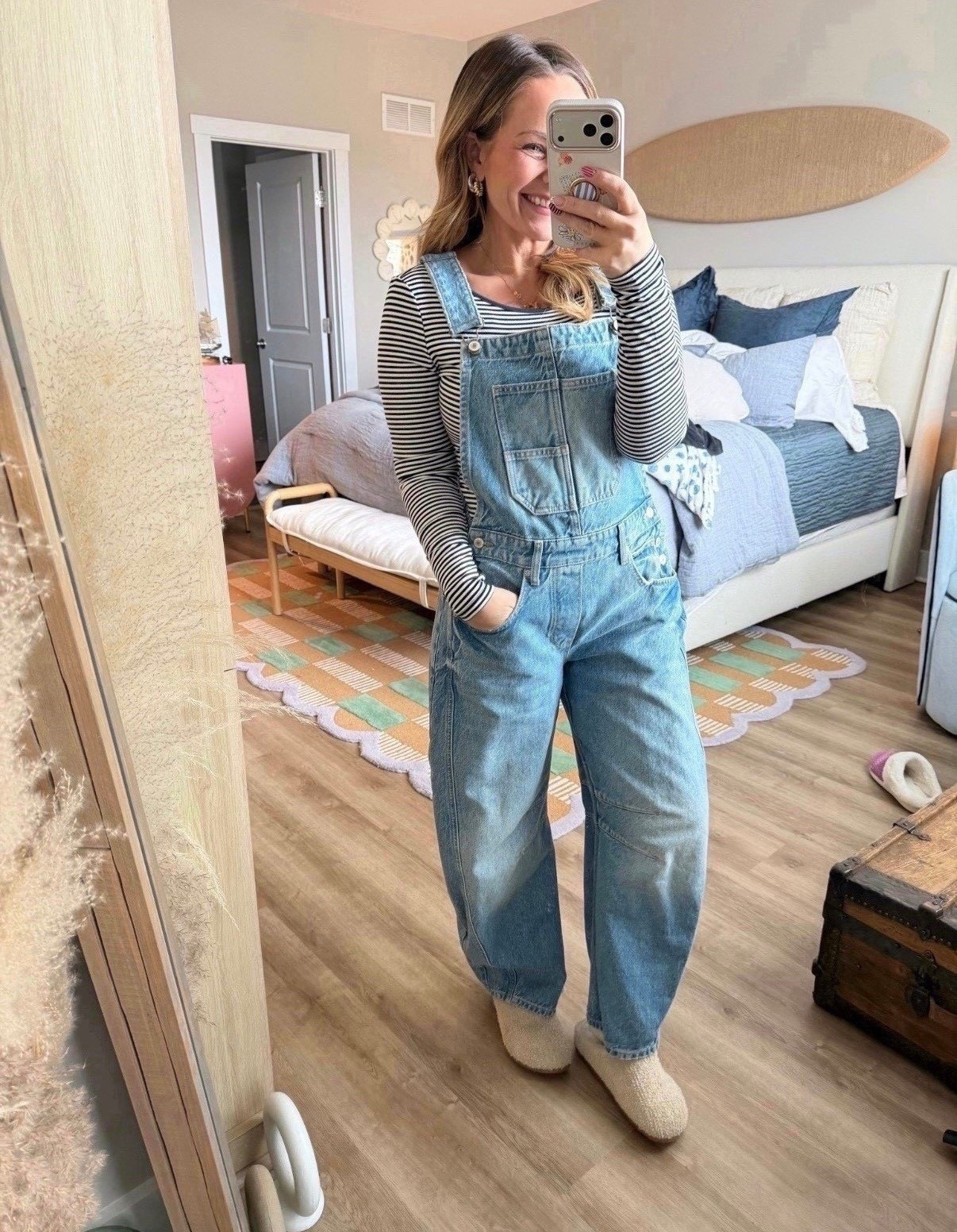 Okay this is peak effortless cool girl energy 👏🏼

Overalls are officially back and I’m not mad about it. These are the perfect relaxed fit — not too baggy, not too stiff — and they layer so well over a simple striped long sleeve. Easy, comfortable, and somehow still looks styled.

Wearing with cozy slippers here, but you could swap for sneakers or clogs and instantly change the vibe.

Fit notes:
• True to size
• Soft denim with structure
• Relaxed wide leg (so flattering)

Linking the overalls, striped tee, and slippers here 🤍 This is one of those outfits you’ll keep reaching for.