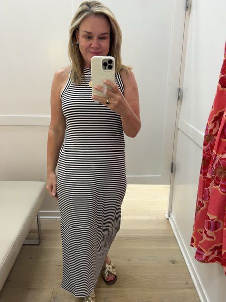 Cute slipped tank dress! 40% off. Would pack great for travel or over a swimsuit for the beach. Dress it up for work with a white blazer. 

#LTKStyleTip #LTKTravel #LTKFindsUnder100