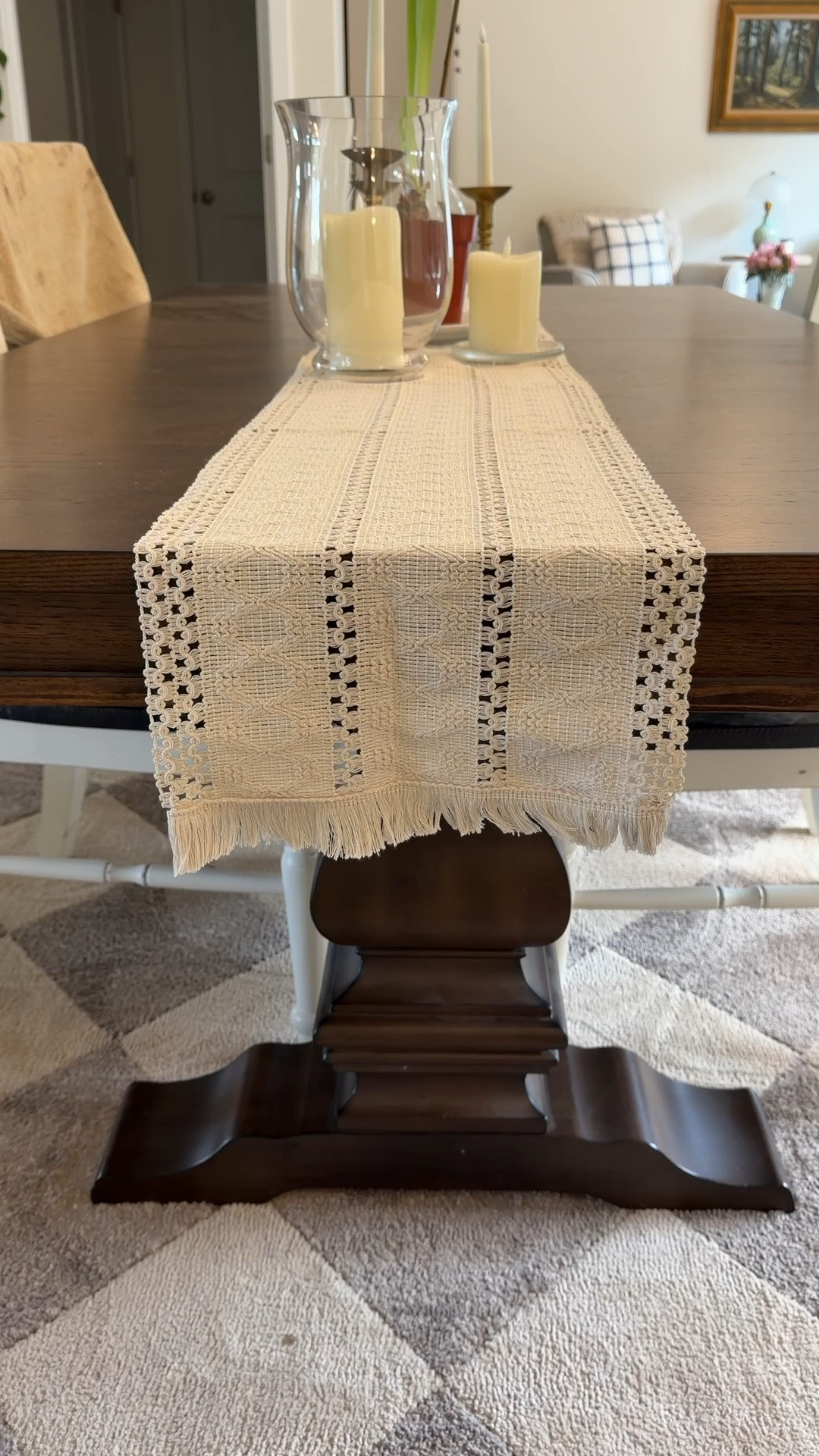 This macrame table runner is one of my favorite simple pieces for the dining table. The cream woven texture and tassel detail add such a pretty farmhouse/boho look and it works year round, not just for spring. You can also see my Barlow trestle dining table, brown diamond area rug, flameless candles, and glass hurricane candle holders styled on the table in this video.

#LTKHome #LTKdayinmylife #LTKstorytime