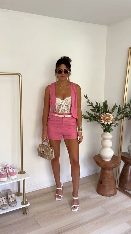 Colorful spring / summer outfit: trouser shorts (size 4) paired with a lace corset (small) and a pink vest (sized up to a 6)

Going out outfit | brunch outfit | girls night | pink outfit | lace corset | shorts outfit 

#LTKVideo #LTKFindsUnder100 #LTKStyleTip