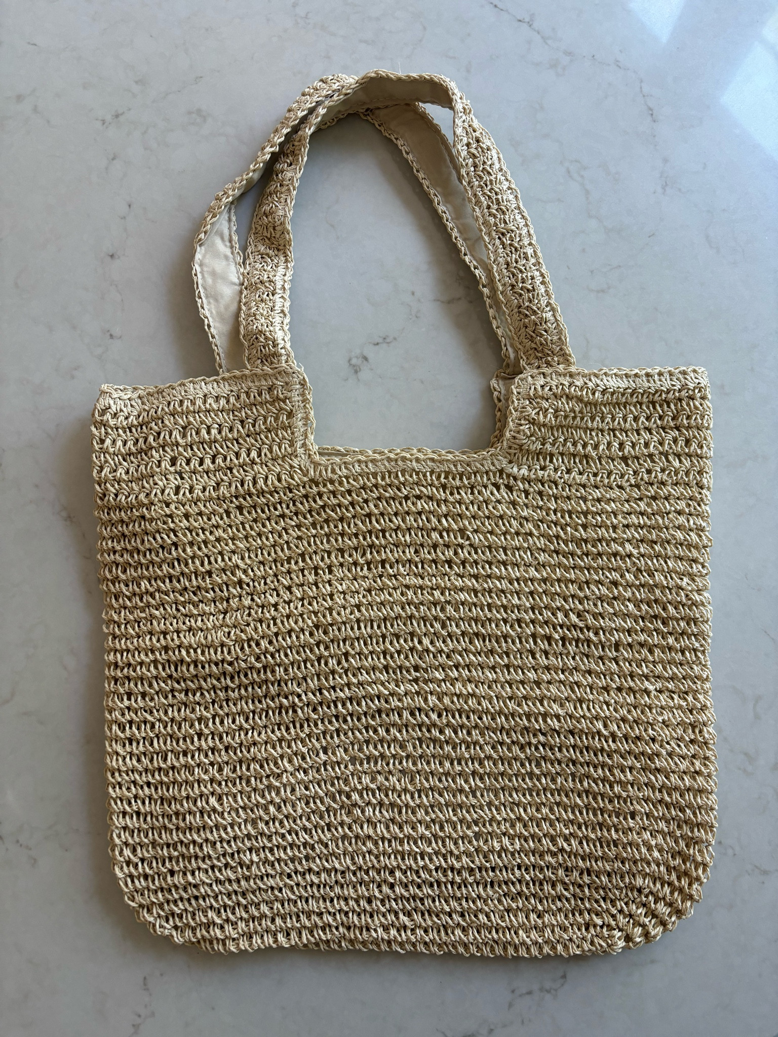 Love this simple raffia tote for summer! Very roomy and under $25!! Great for travel as its thin & lays flat. 