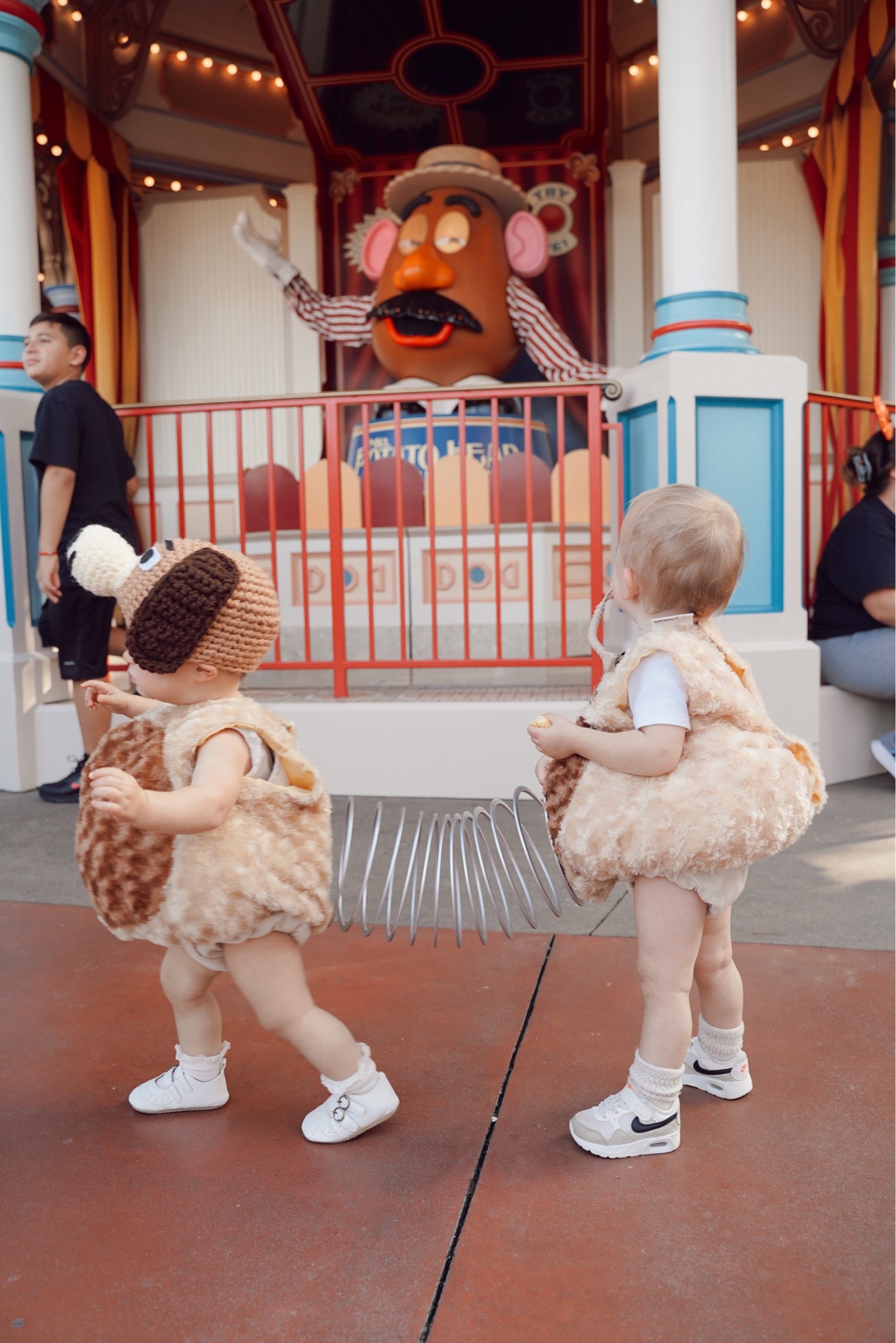 Slinky costume! I spray painted the slinky a slightly metallic silver and cut it in half (maybe even a bit smaller than half). I cut a small slit in the front of Hudson’s costume to wrap the slinky in and coiled into the back of Harper’s and used the costume Velcro to secure it. She’s been wearing this hat around the house for weeks to get used to it so she wouldn’t pull it off right away 😂

#LTKHalloween #LTKkids #LTKbaby