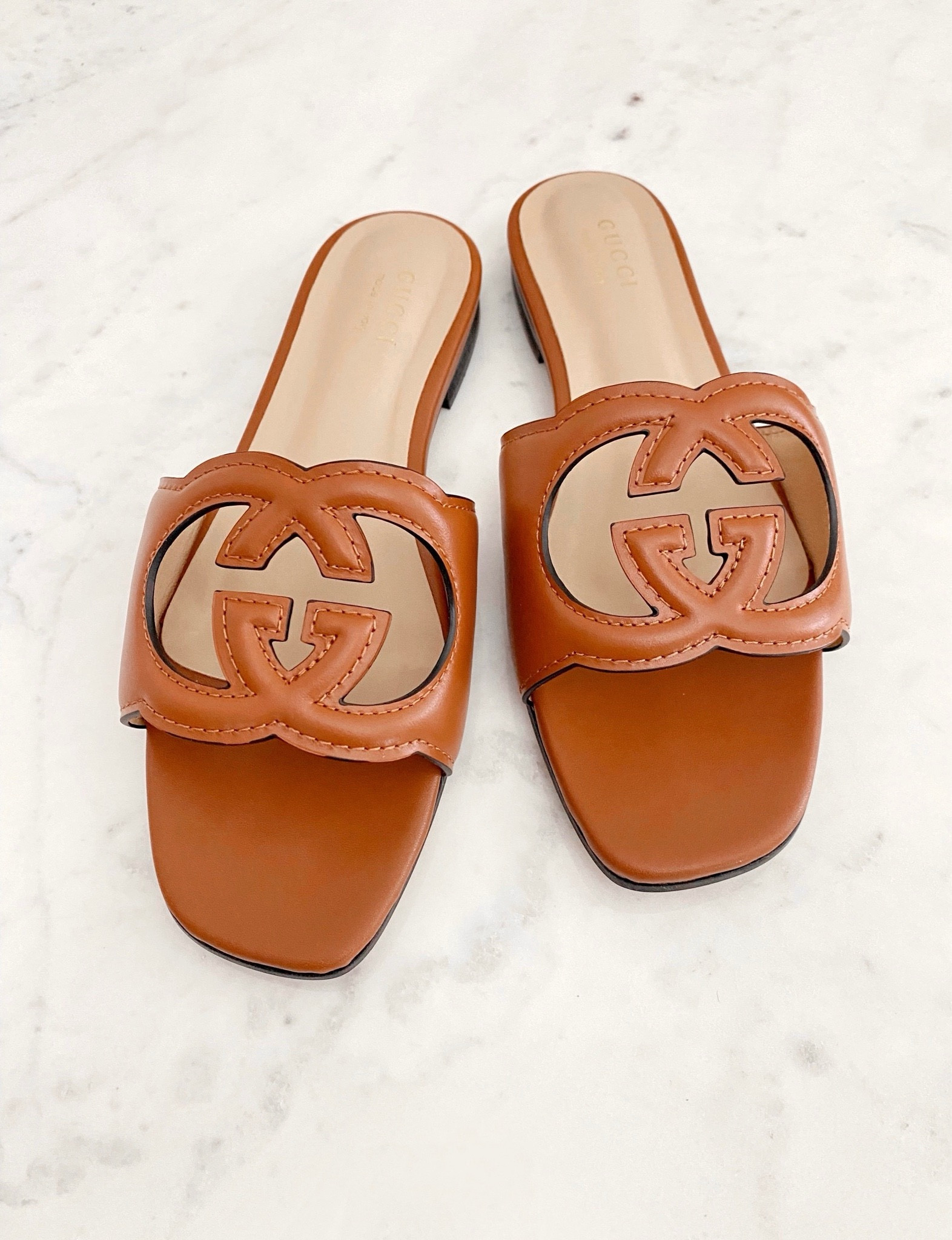 Gucci DUPE 🫶🏻🩷 

Im a size 7/7.5 (and I got the size 38 and they JUST fit)….I re-ordered in the size 39 and they’re perfect! (Color: #14) —I also have black and white! This seller ships FAST and the quality is fantastic!

Sandals, Gucci, designer sandals, look for less 

#LTKshoecrush #LTKfindsunder100 #LTKstyletip