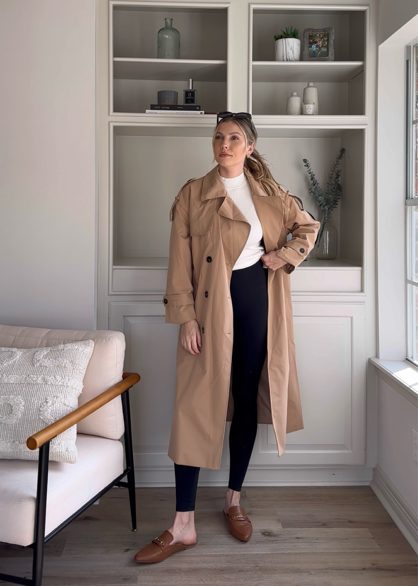 Easy black leggings outfit to transition into spring! Wearing a small in leggings, M in mock neck sweater tank, and S in trench coat. Size up half in loafers.

#LTKstyletip #LTKSeasonal