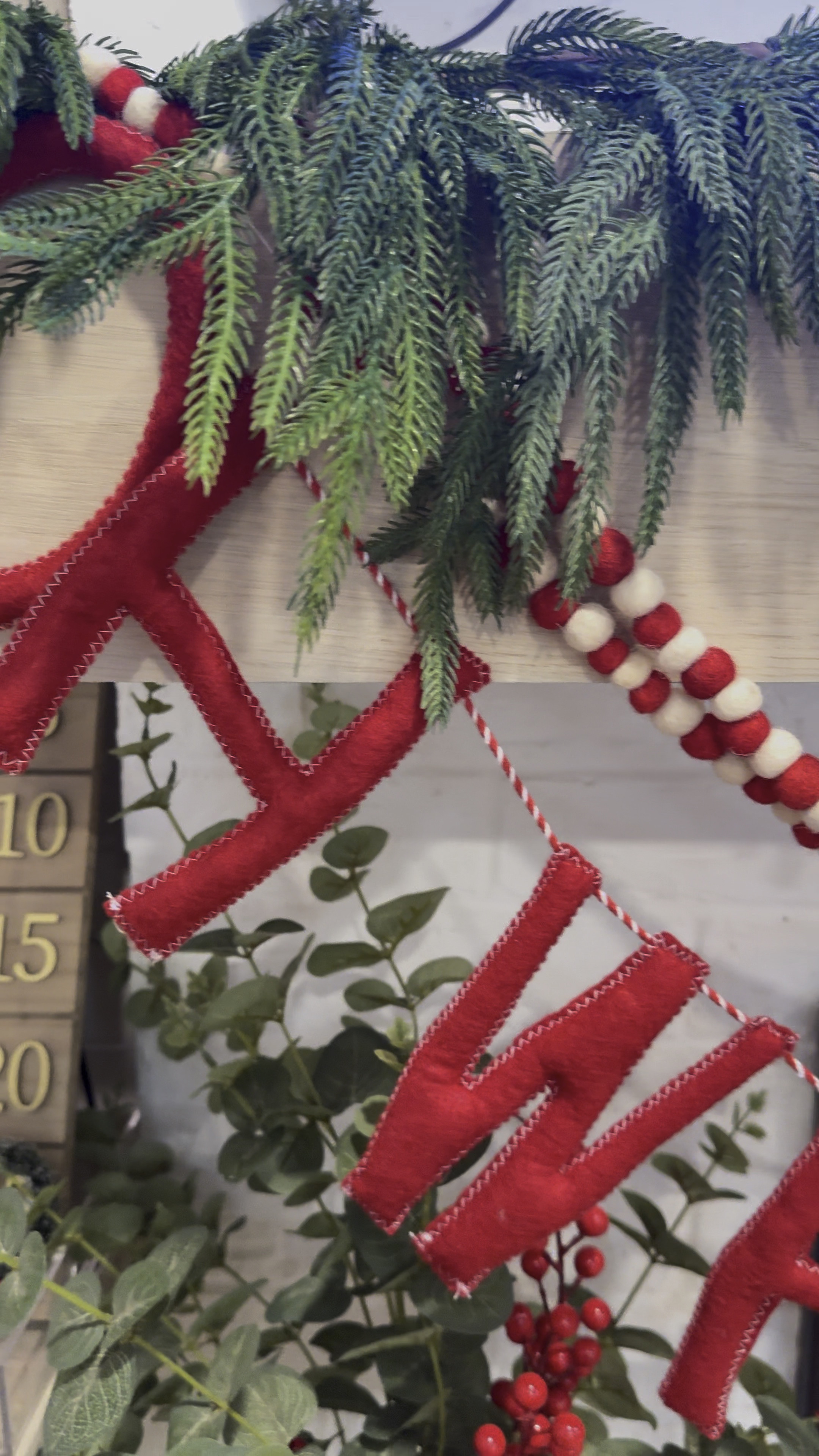 A fun christmas garland! 

Christmas decor, holiday mantle, fireplace decor 

#LTKHome #LTKSeasonal #LTKHoliday