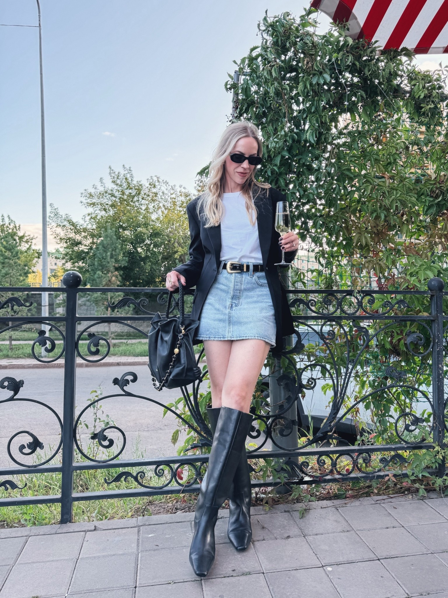 Date night outfit with oversized black blazer, white tee and @levi denim mini skirt with boots

#LTKOver40 #LTKSeasonal #LTKSaleAlert