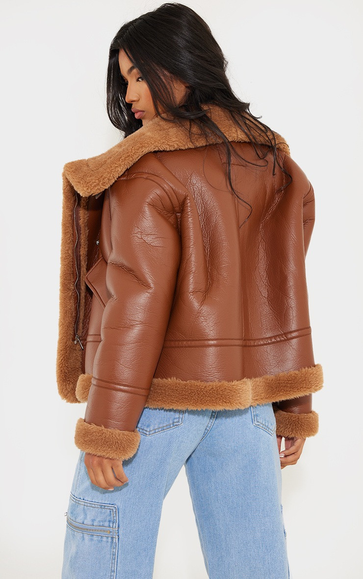 Brown Faux Fur Lined Faux Leather Buckled Aviator Jacket | PrettyLittleThing US