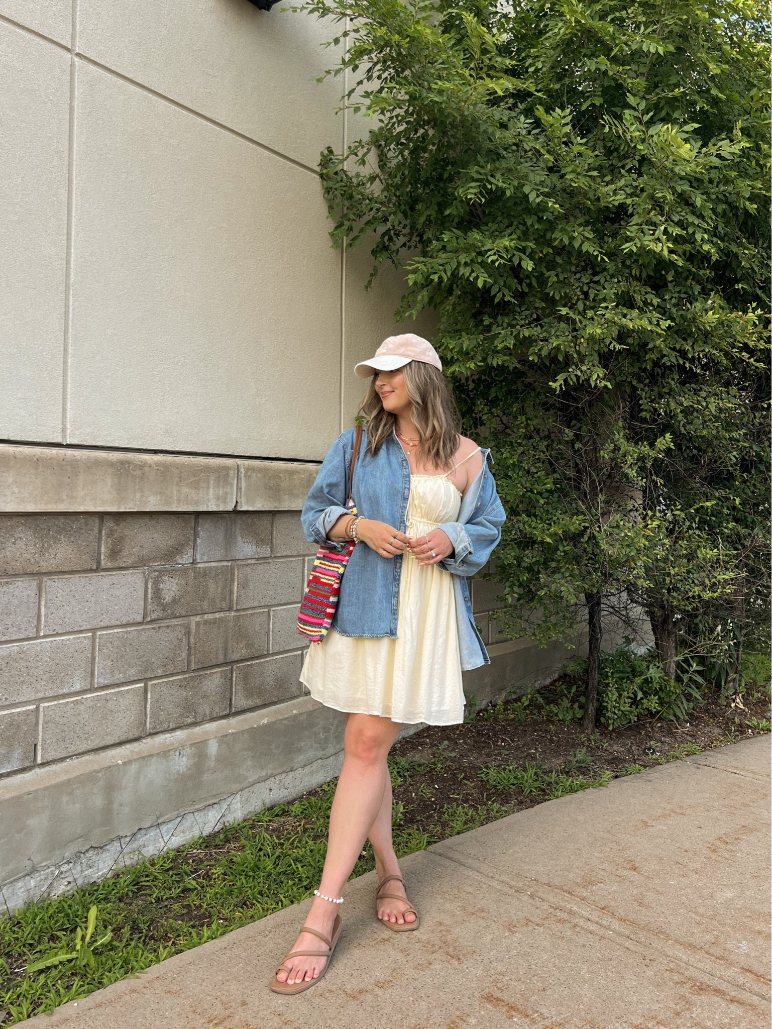 Easy summer outfit! My butter yellow dress is old from aerie, but I linked a super similar option! Wearing my usual size L in the denim shirt. Crocs sandals are super comfy, I’m a 9.5-10 shoe and wear a 10. Canadian shirt, sandals, and bag links are under “similar products”

#LTKdresses #LTKsummer #LTKmidsize