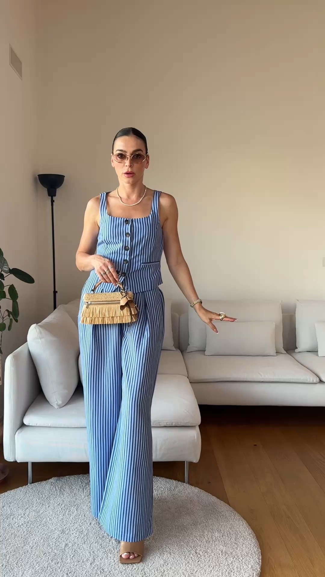 This Mango matching set is such an effortless wardrobe piece.

I’m wearing the Striped Fluid Trousers in Light Blue, EU 36 / UK 8 / US 4, paired with the matching Striped Button Vest, Size S.

For reference, I’m 173 cm (5’8”).

The trousers have a beautiful fluid straight-leg fit with a high waist and front pleat details, while the linen-blend vest keeps the whole look clean and polished.

Wear the full set now with heels, ballet flats or sandals, then transition it into cooler weather with a trench, oversized blazer or leather jacket.

You can also layer a fitted long-sleeve top underneath the vest or add a soft knit over the whole set when autumn starts.

Both pieces work perfectly separately too. The trousers look beautiful with shirts, knitwear and simple tops, while the vest is so easy to style with denim or tailored trousers.

This is one of those matching sets that gives you so many outfits from just two pieces.

🔎 Mango matching set, Mango co ord set, Mango two piece set, Mango striped set, Mango blue striped trousers, Mango striped vest, Mango linen blend vest, Mango transitional outfit, late summer outfit, early autumn outfit, Mango workwear, Mango office outfit, striped trousers outfit, capsule wardrobe, transitional fashion, September outfit ideas, elegant everyday style, Mango new in

#LTKuk

#LTKeurope #LTKstyletip #LTKautumn