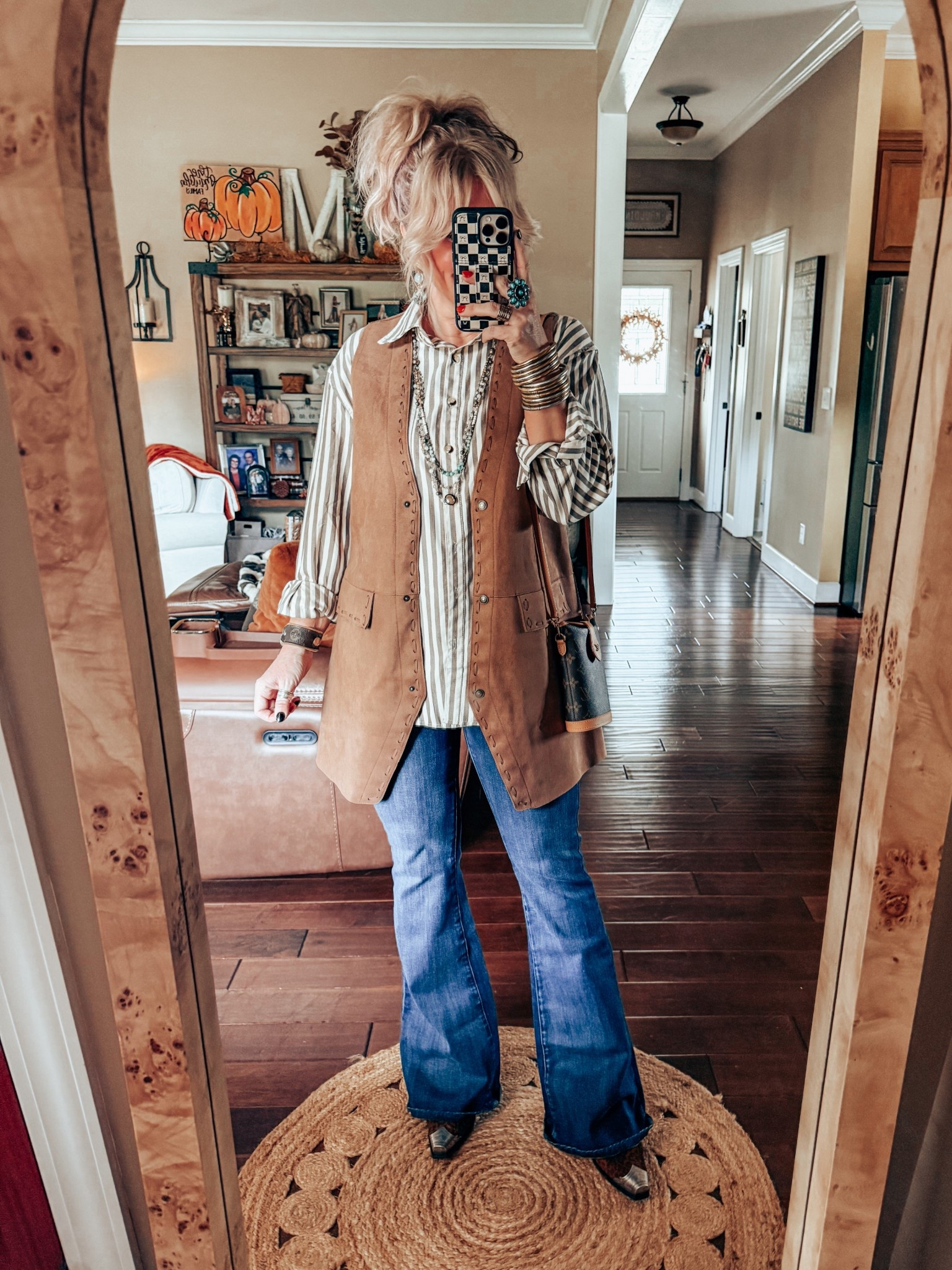 This vest and button up are both Free People inspired and SO GOOD! I’m wearing my true size medium in them. These jeans are also amazing, love the fit, stretchy denim,  and they come in other colors. I’m wearing my true size in them too  

#LTKStyleTip #LTKFindsUnder100 #LTKOver40
