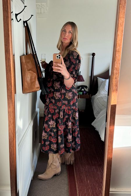 Loved this dress I wore for our wedding anniversary dinner date! Even received a few compliments from strangers. Wearing a size large and it fit perfectly .

floral dress | smocked dress | cowboy boots | date night | fringe boots | sustainable fashionn

#LTKOver40 #LTKMidsize #LTKShoeCrush