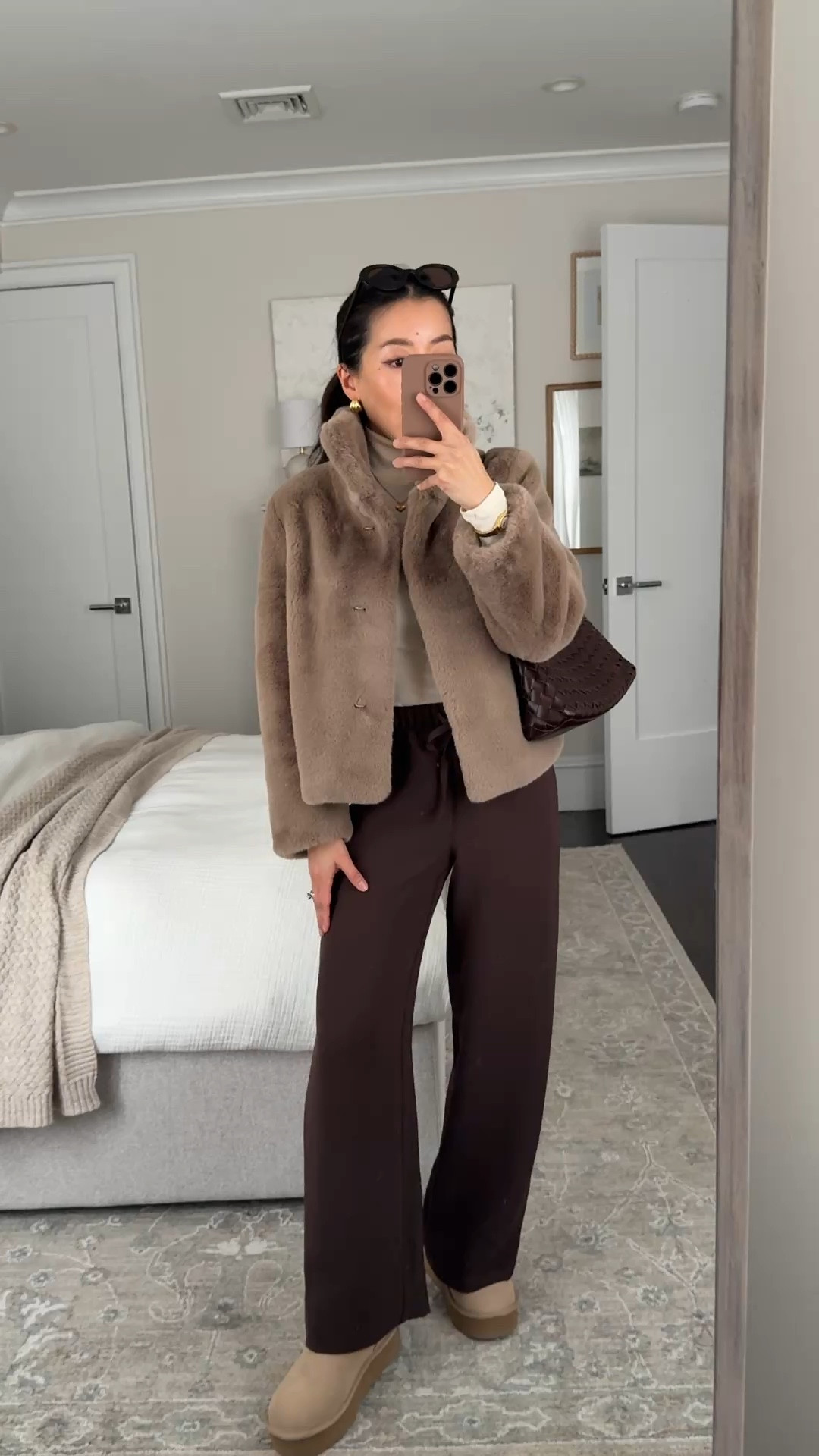 Pants restocked! And Gorgeous faux fur jacket 15% off through end of March with code JEAN15

• Alice Walk faux fur jacket size xs is petite friendly. Plush, gorgeous latte color, lined and has blue satin piping. 

• Aritzia lodge pants in 2XS short - the best! Pull on elastic waist, wrinkle resistant and beautiful drape. Now comes in cropped too

• old Madewell turtleneck, linked similar

• Ugg kids size 4 = women’s 6 

• Anthropologie woven shoulder bag

• Madewell oval sunglasses

Cozy coat outfit, petite friendly mom outfit, winter errand fit

#ltkseasonal #ltkmomlife #ltkpetite