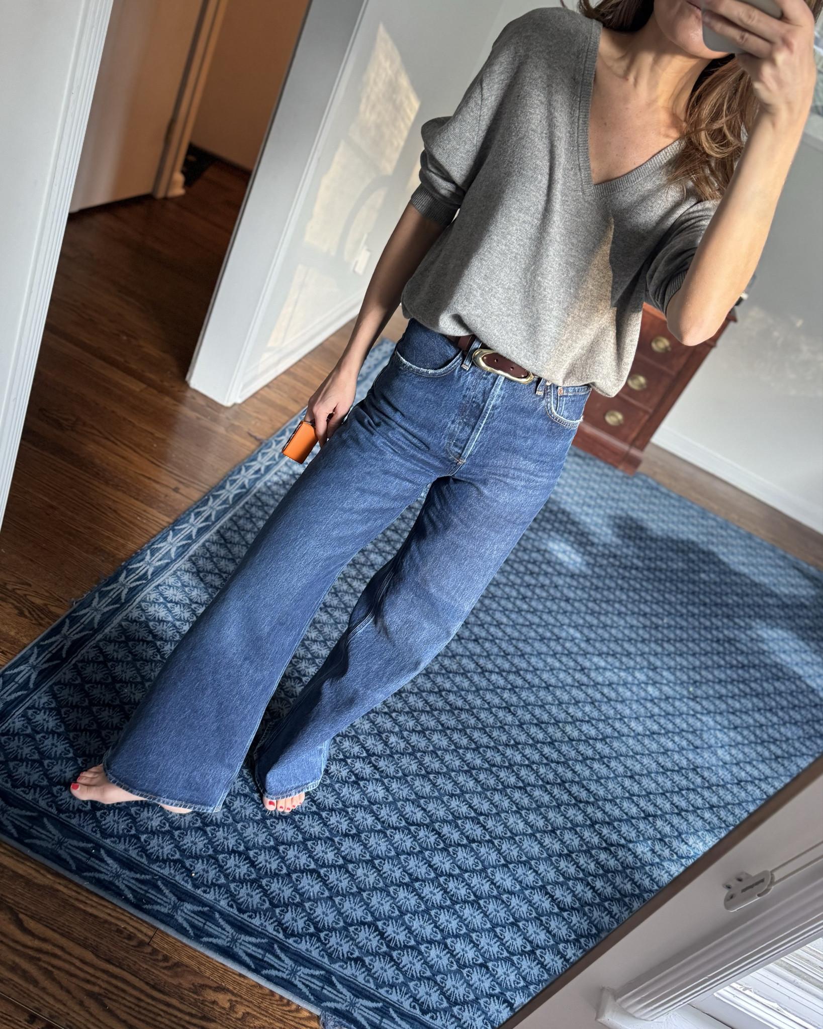 the perfect vneck & love these wide leg jeans. Wearing my true size in the sweater (small) and my smaller size (24) in the jeans. 