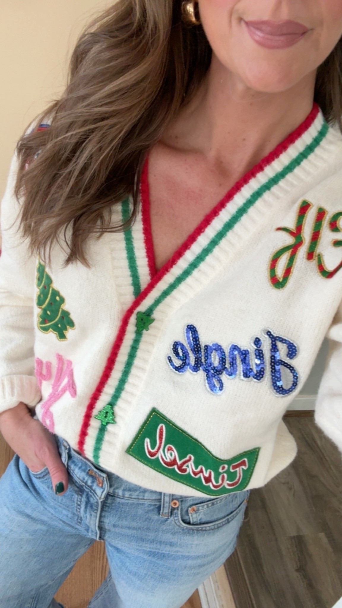 Such a fun and festive Christmas sweater without being too tacky! Love the patches and different colors. Functional buttons. True to size and under $40! Looks to be limited availability but you may find your size!