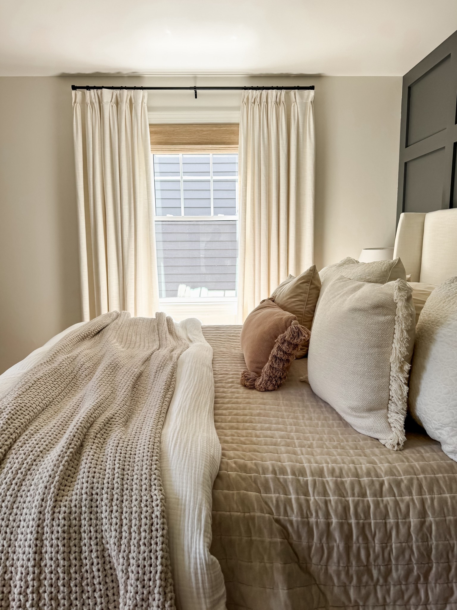 Twopages Home. Bedroom design. Blackout curtains. Blackout motorized blinds. Quilt. Throw blanket. Duvet cover. Neutral decor. Upholstered bedframe. Dresser. Area rug.

#twopageshome

#LTKHome #LTKSaleAlert