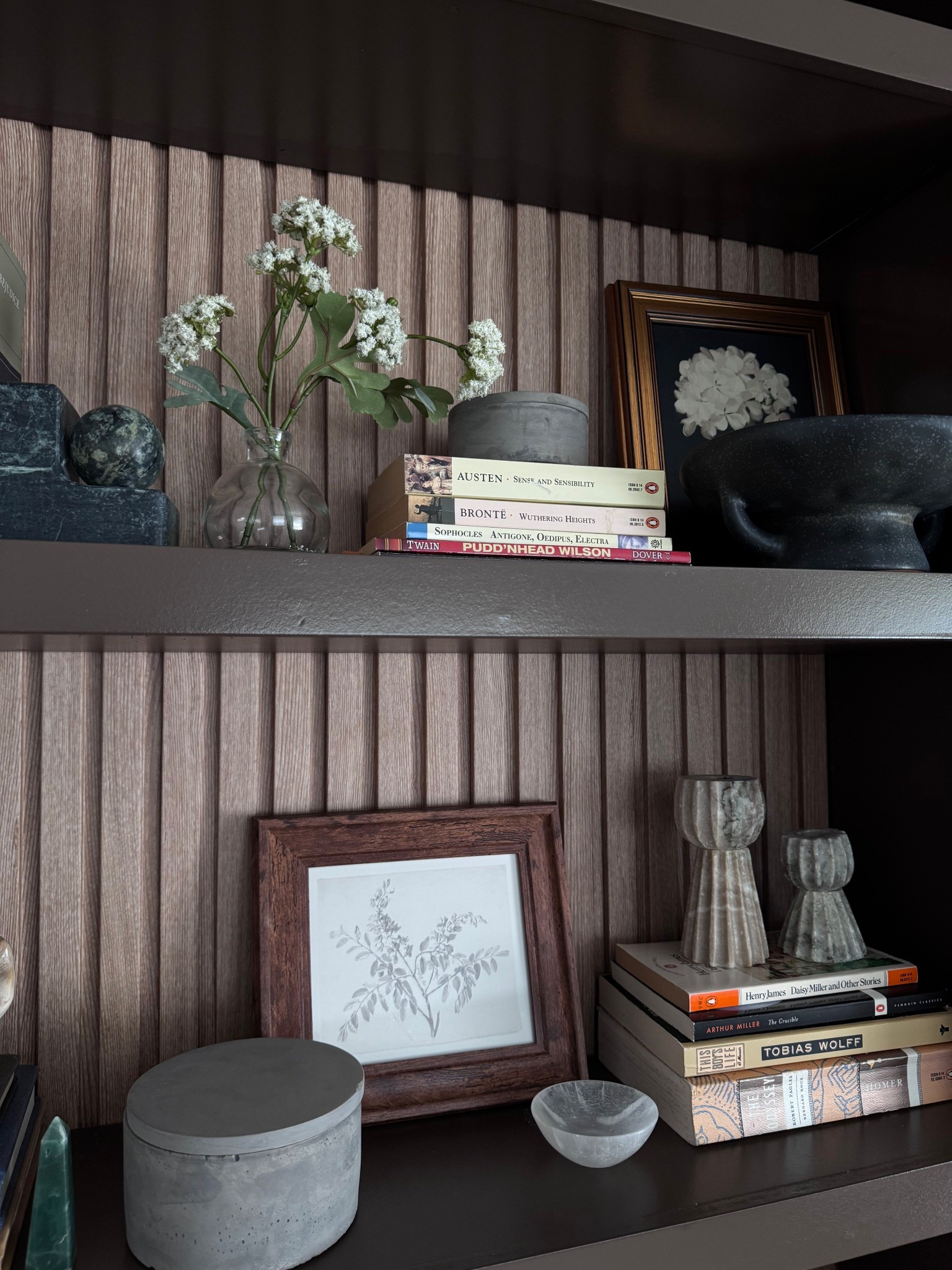 @Target spring home decor line is here! Shelf styling does not have to be expensive to look expensive. This dark, moody bookshelf moment uses a mix of Target finds, Amazon home decor, and thrifted classics to create that layered, editorial look you see in designer spaces.
The key is mixing textures: a ribbed concrete box, a marble mini bowl, sculptural stone candleholders, and a botanical print in a warm wood frame. Stack a few classic books horizontally for height, tuck in a small glass bud vase with white flowers, and suddenly your shelves look intentional.
Everything linked is affordable, easy to find, and ships fast. Shop the full shelf look through the link in my profile.
This post contains affiliate links. I may earn a small commission at no extra cost to you.

#LTKHome #LTKFinds #LTKSaleAlert #darkmoodyhomedecor #shelfstyledecor #amazonhomedecor #targethomedecor #budgethomedecor

shelf styling ideas, moody home decor, dark academia shelf decor, Amazon home finds, Target home decor, budget shelf decor, affordable home styling, bookshelf decor ideas, home decor on a budget, stone and marble home accents, cozy dark home aesthetic, sculptural home decor, spring decor


#LTKHome #LTKMothersDay #LTKSaleAlert