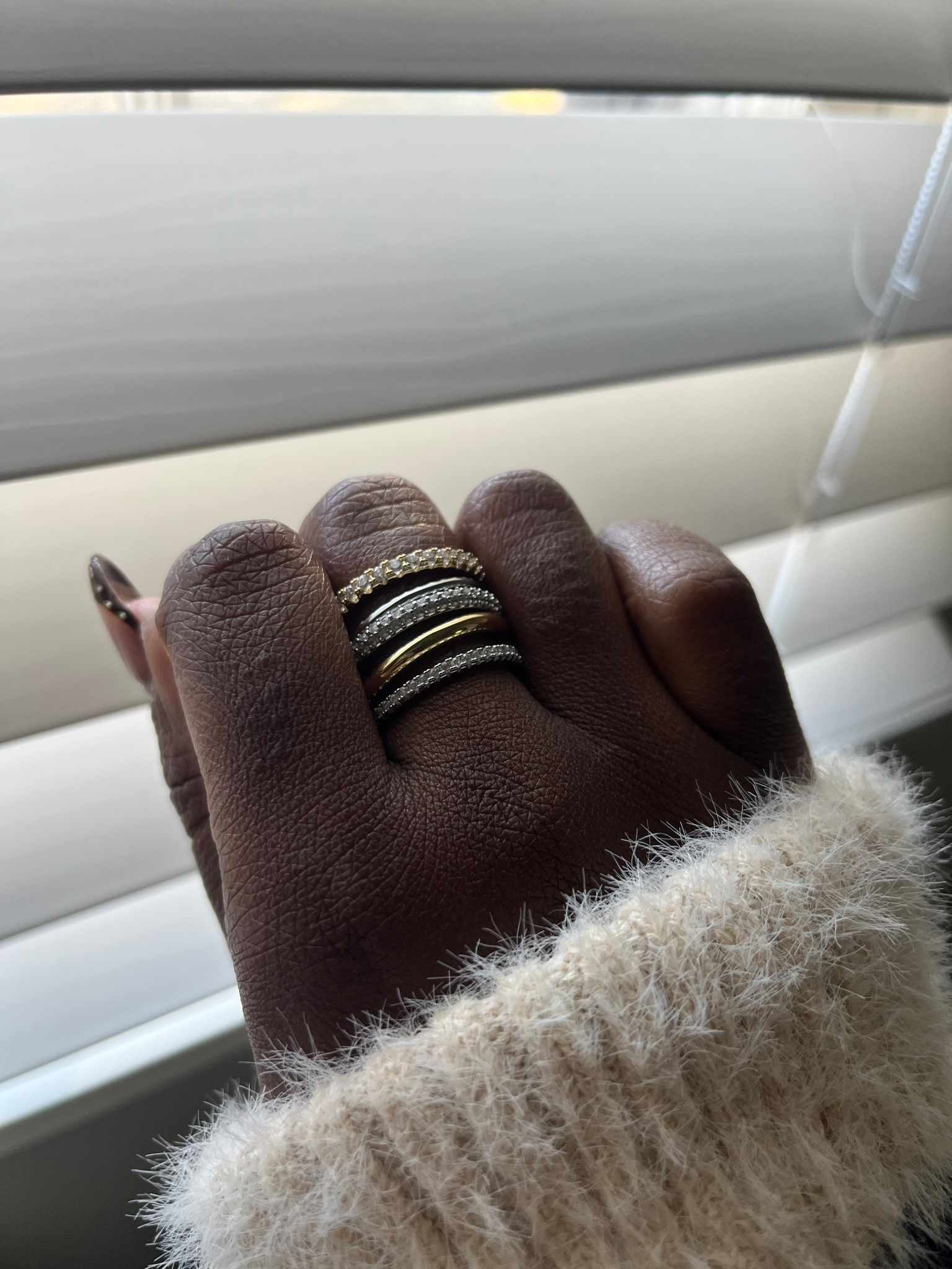 I get so many compliments on this ring stack! The smaller rings holding the stack together don’t bother me at all. They’re actually fun to play with while I’m thinking. 

Amazon find Gold Stackable Rings for Women, 14K Gold Plated Cubic Zirconia Rings, Silver Gold Multi Ring Mixed Metals Stackable Ring Set for Women

#LTKGiftGuide