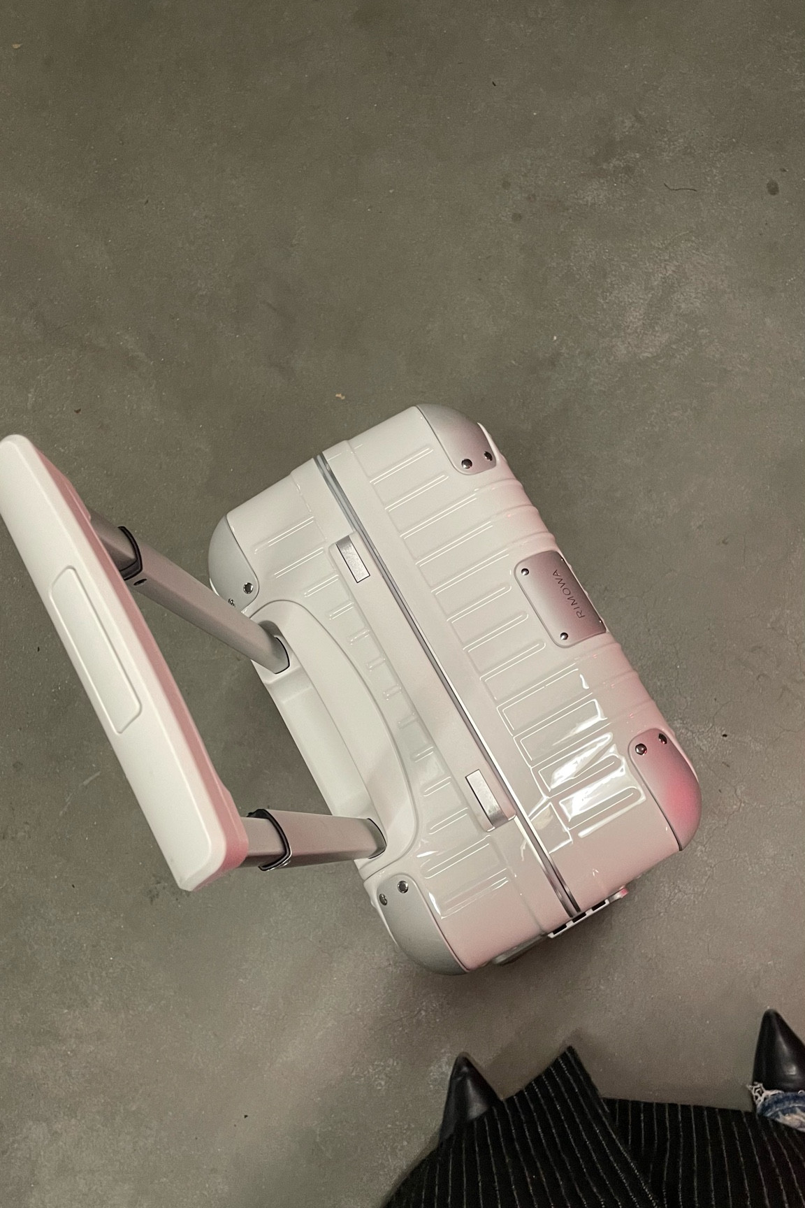 Rimowa Hybrid Cabin in White. I’ve had mine for a while now and I can’t recommend it enough. It’s at least 0.5kg lighter than the aluminum version and it’s super easy to roll around and bring while travelling. I can usually fit quite a lot of outfits in it and still manage to bring shoes & bags.

tip: check out 24S as they carry a ton of Rimowa options. They do great sales as well and I love collecting points there for higher rewards in my future purchases 🤍

#LTKtravel #LTKHoliday LTKFestiveSaleNL