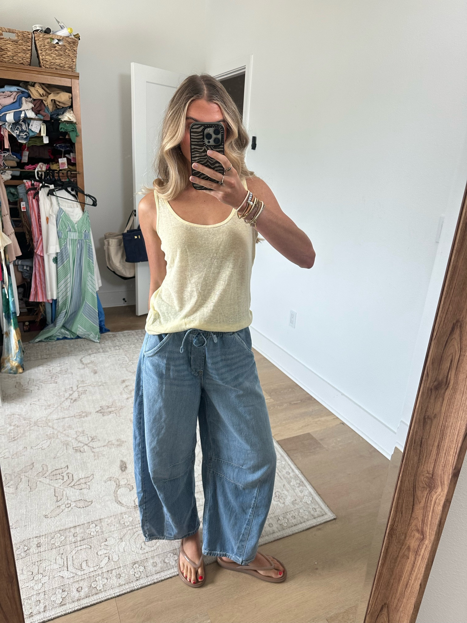 Gap size XS mid rise easy horseshoe jeans. An exaggerated curve. An extra loose leg. ​A barrel fit goes extra wide — and becomes completely new.

Fit: An ankle-length horseshoe jean that's fitted at the waist with an exaggerated curved leg and tapered ankle. My top is also size xs from Gap in yellow and my @crocs flip flop sandals

#LTKootd #LTKdayinmylife #LTKSeasonal