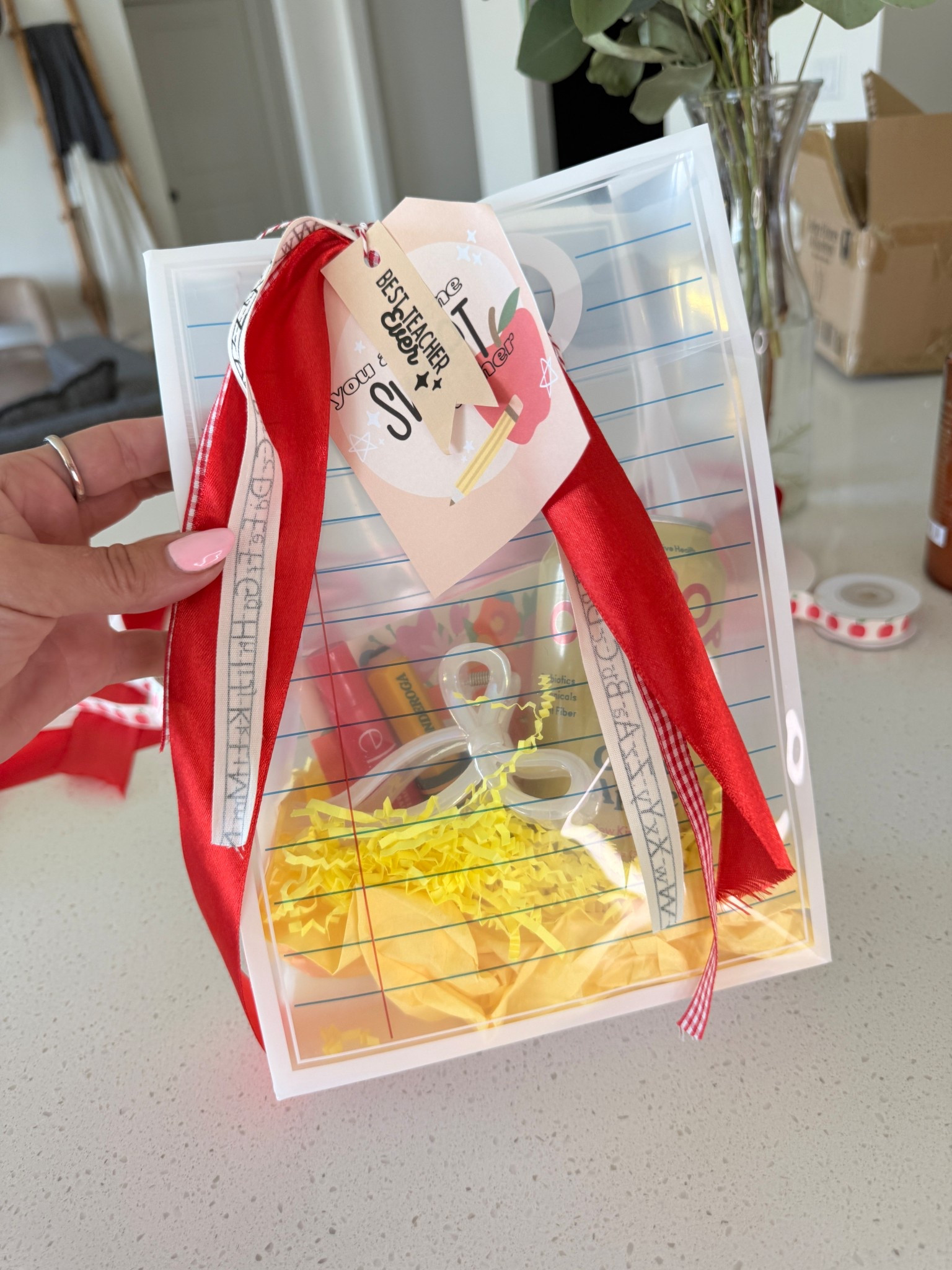 Teacher gifts ideas in the cutest paper themed gift bag 